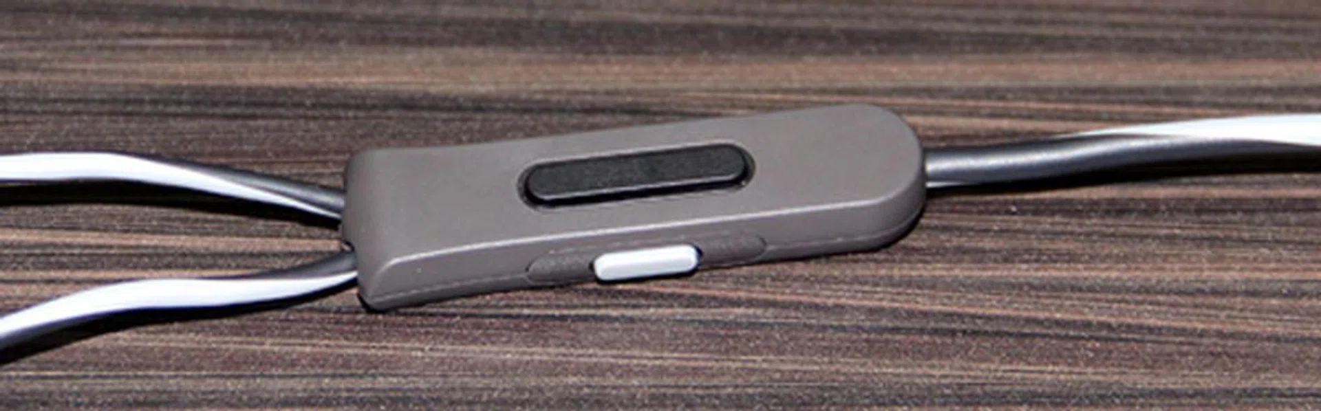 The handy Aware mode can be activated via the white button shown in this control pod. Aware allows you to listen to your ambiance, without removing the earphones.