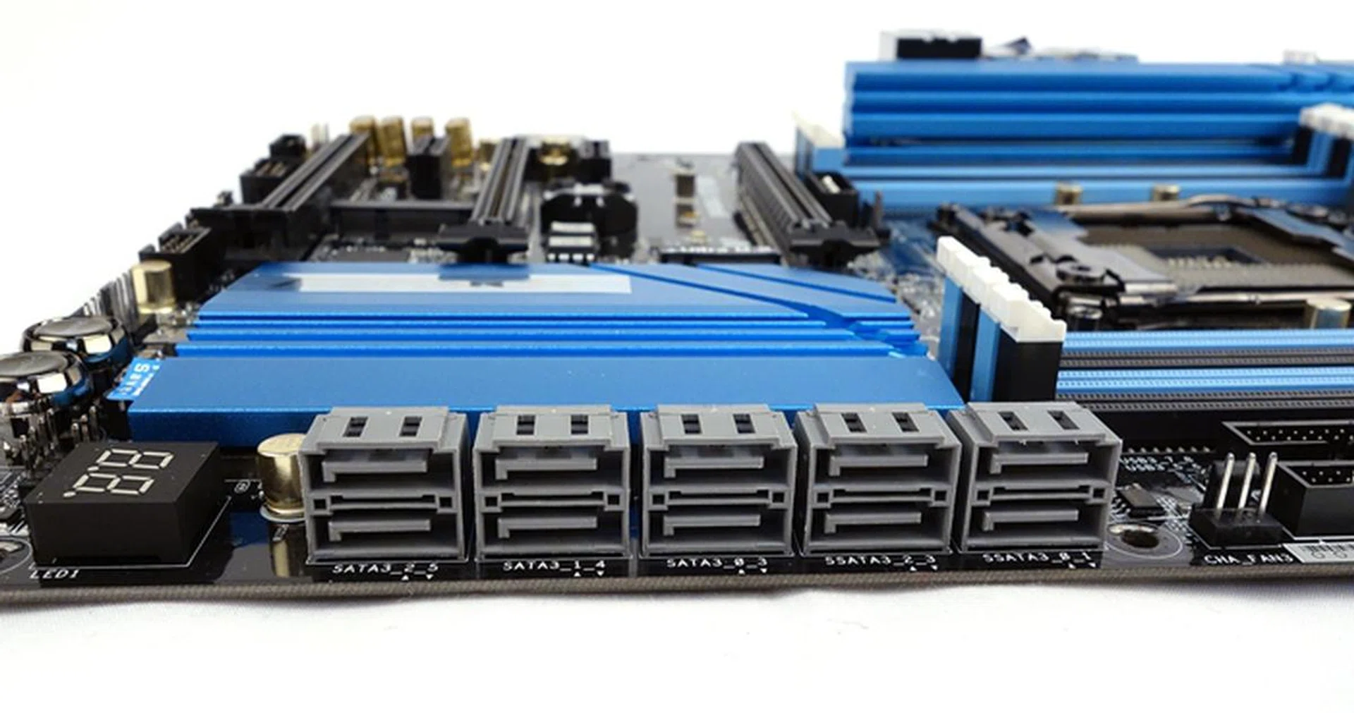 Grey and drab; there are eight SATA 6Gbps connectors.
