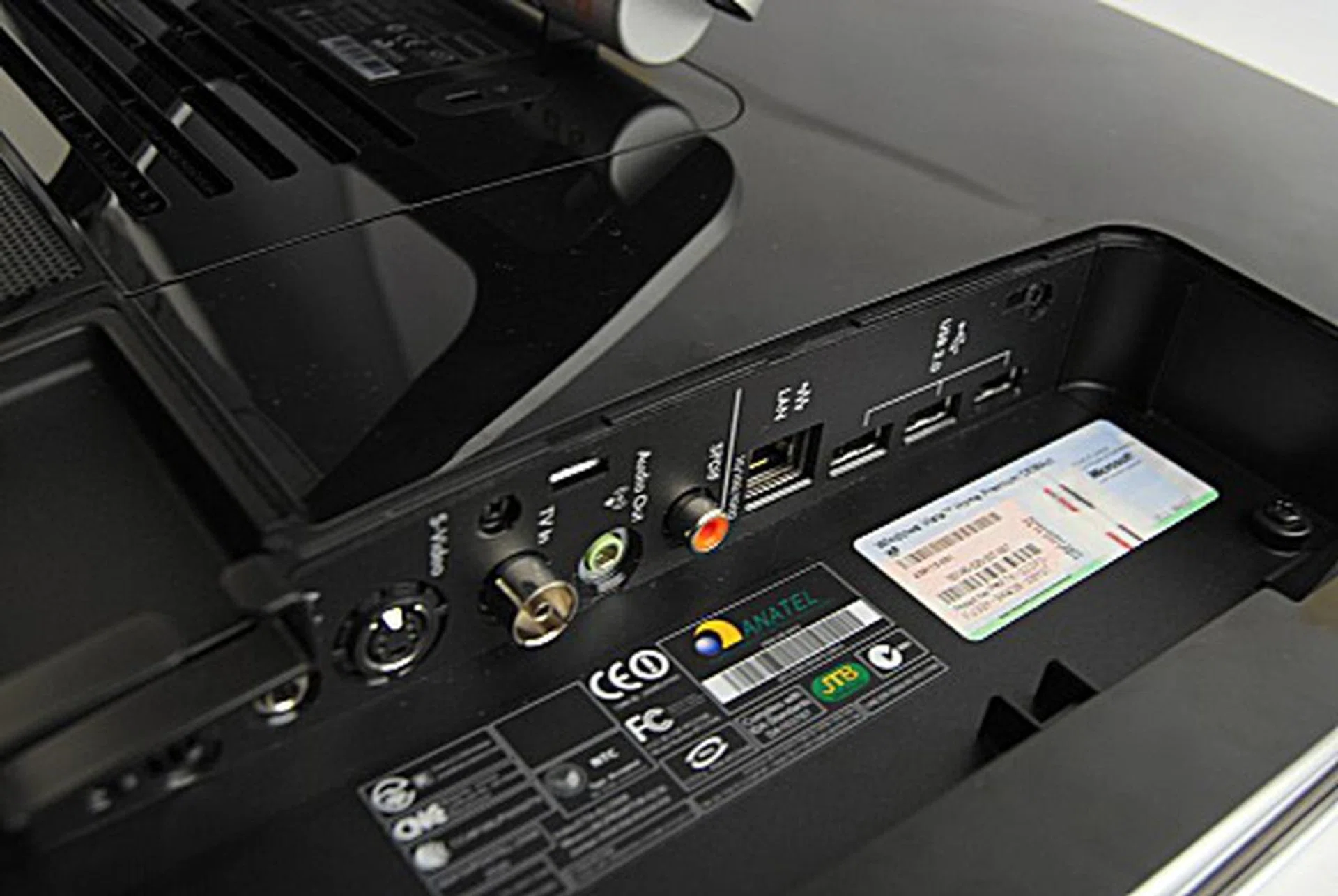 A hidden compartment on the back opens up to reveal three more USB 2.0 ports, a LAN port, an S/PDIF out, an audio in/out jacks, a TV-in and a S-Video port.