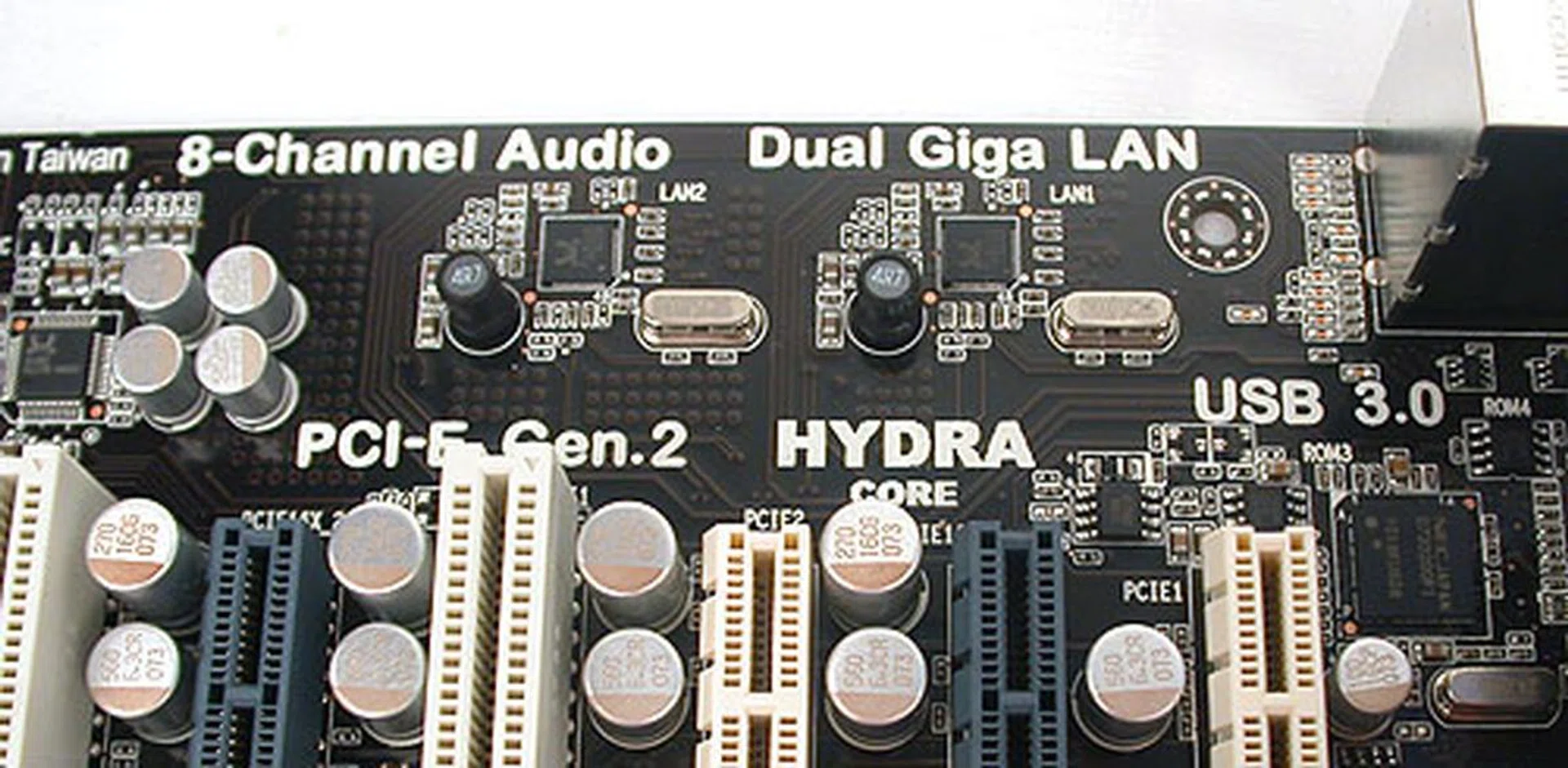 More indications of what this board has, like its HD audio, dual Gigabit LAN and of course, Hydra! And like a certain vendor, ECS states proudly on the PCB that this board is 'Designed in Taiwan'.