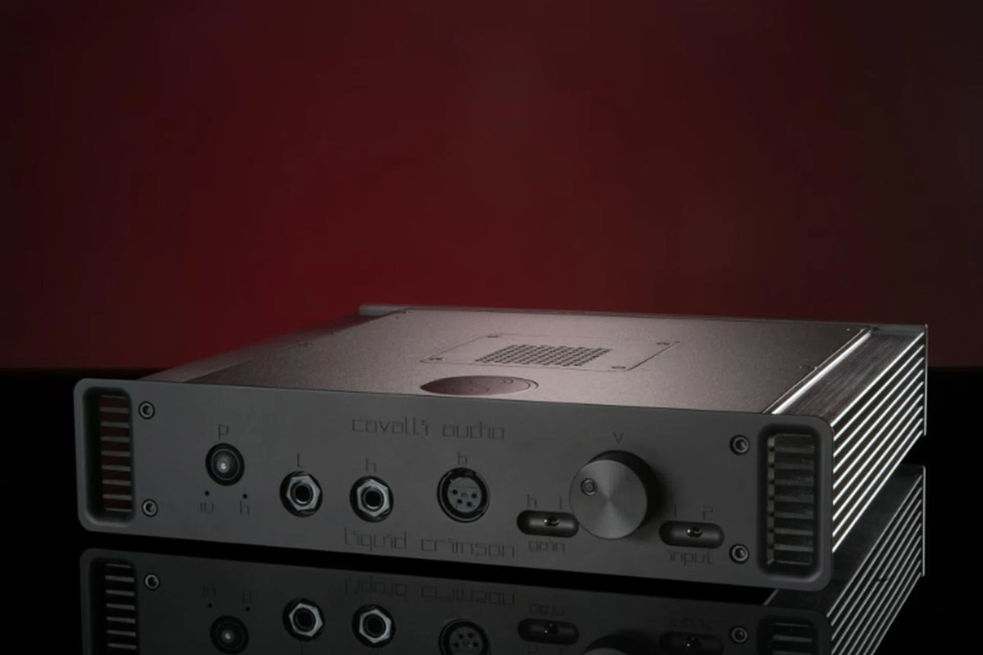 The legendary but now discontinued Cavalli Audio Liquid Crimson is a hybrid tube amplifier that uses a single 6922 tube. (Image source: Headphone Guru)