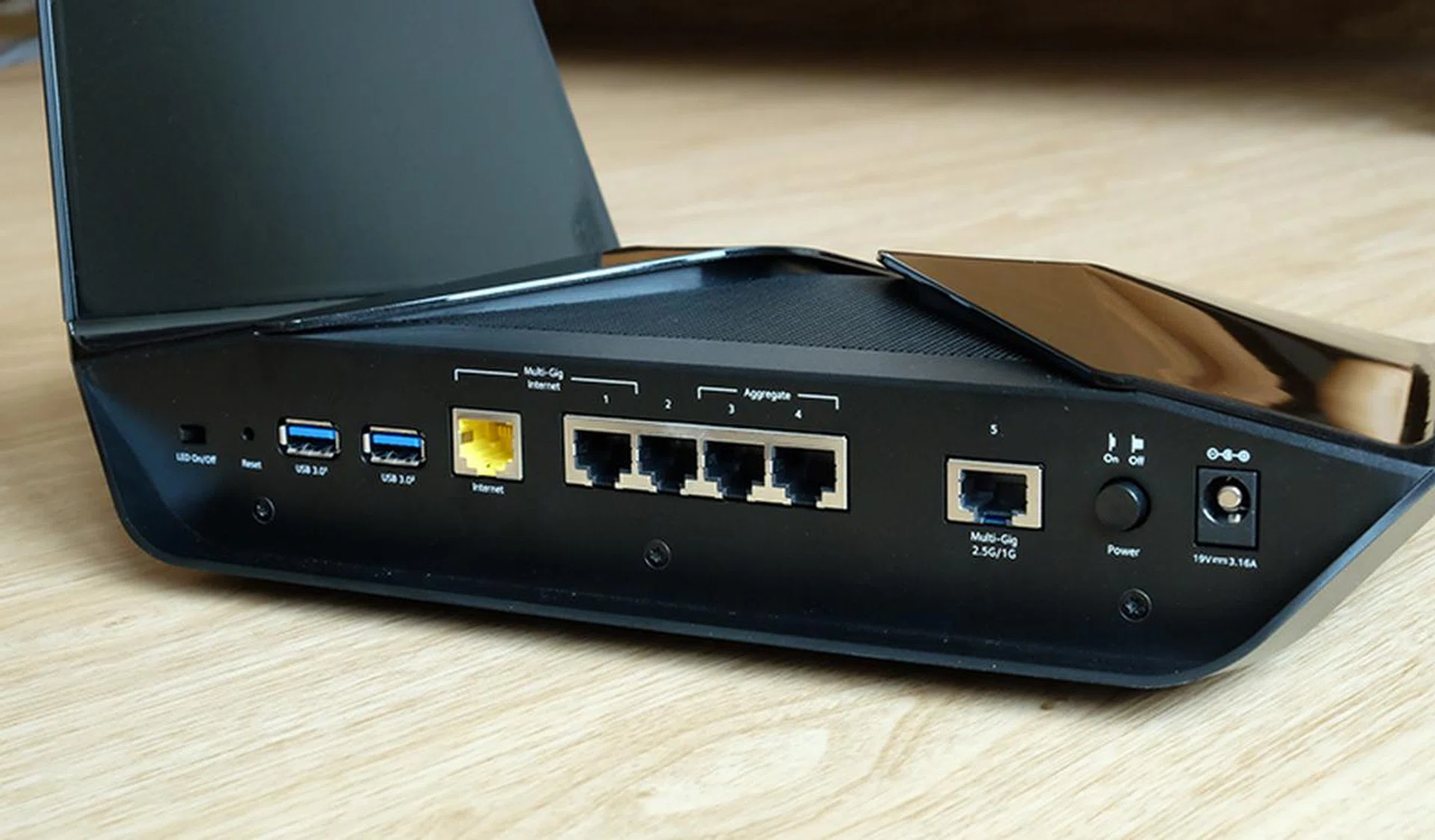 All of the ports are located behind the router.