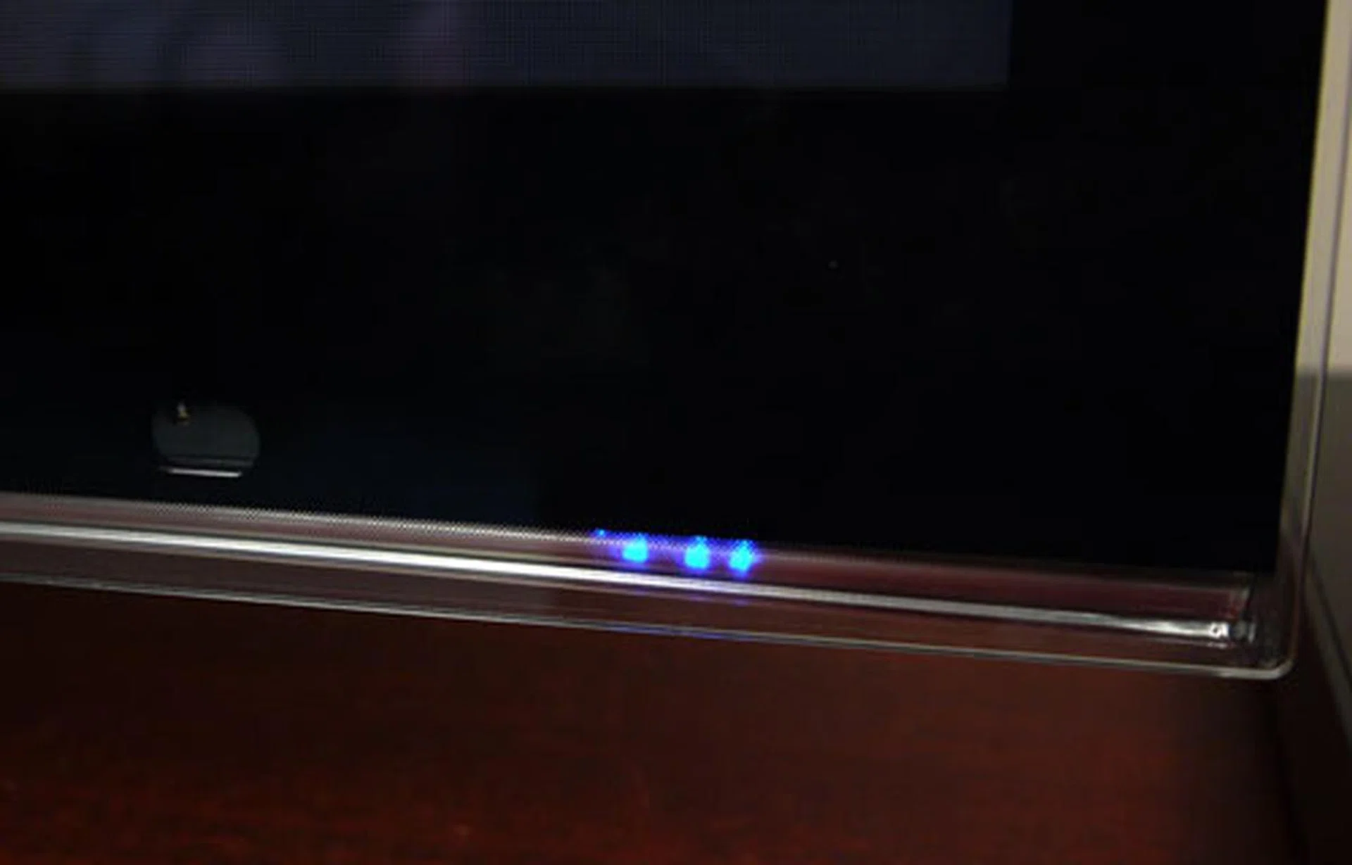 These blinking blue LEDs aren't a photo mishap but indicators which are illuminated in succession once the unit is powered on. Thankfully, they'll vanish from view once the unit is fully initialized. 