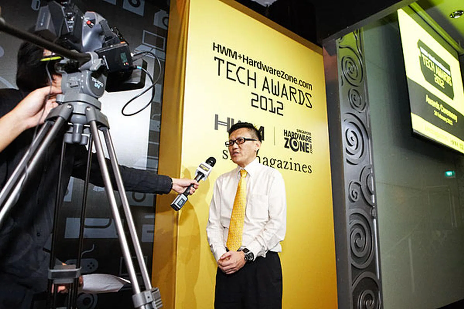 While the rest were making merry, our video team was hard at work capturing the happenings and interviewing people. Being interviewed here was Mr. Andrew Koh from Canon Singapore.
