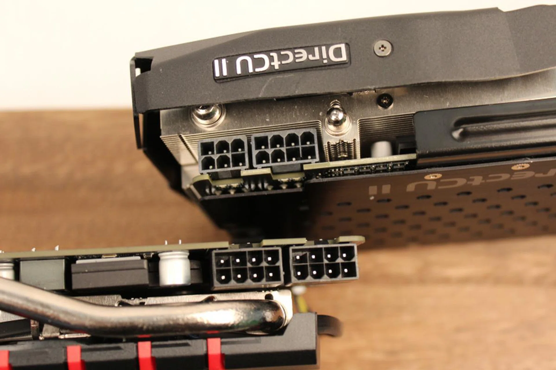 Since a pair of split PCIe power connectors are provided (6+2 pins), it bodes well for different power connector configurations such as on the ASUS Radeon R9 290X (top) and the MSI GeForce GTX 980 (bottom).