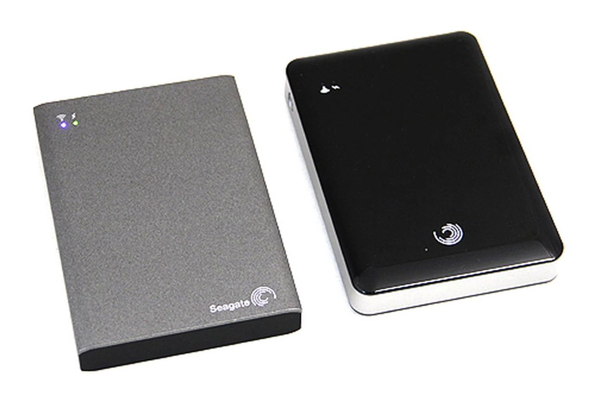 On the left is the new Seagate Wireless Plus and on the right is the older GoFlex Satellite.