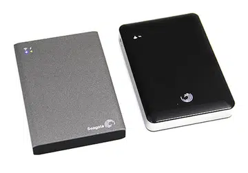 On the left is the new Seagate Wireless Plus and on the right is the older GoFlex Satellite.