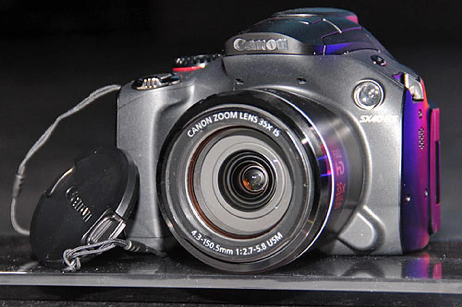 The PowerShot SX40 HS is a 35x (24-840mm) zoom camera with manual exposure control. It makes for a great all-in-one camera. 