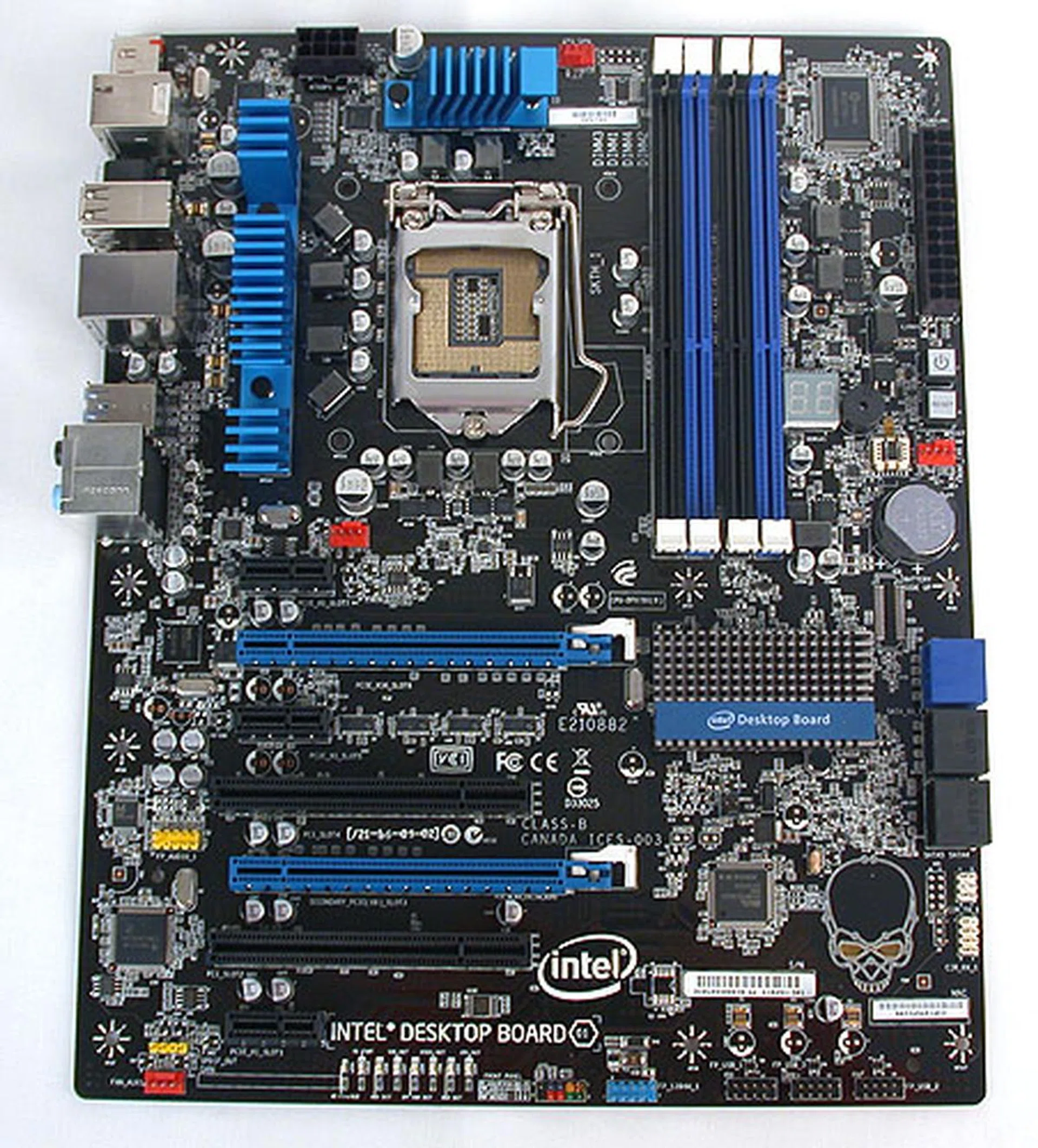 Intel has produced a very decent looking P67 board that even enthusiasts won't mind using. The silk-screen skull head at the bottom right of the PCB can be illuminated by LEDs, and turned off in the BIOS.