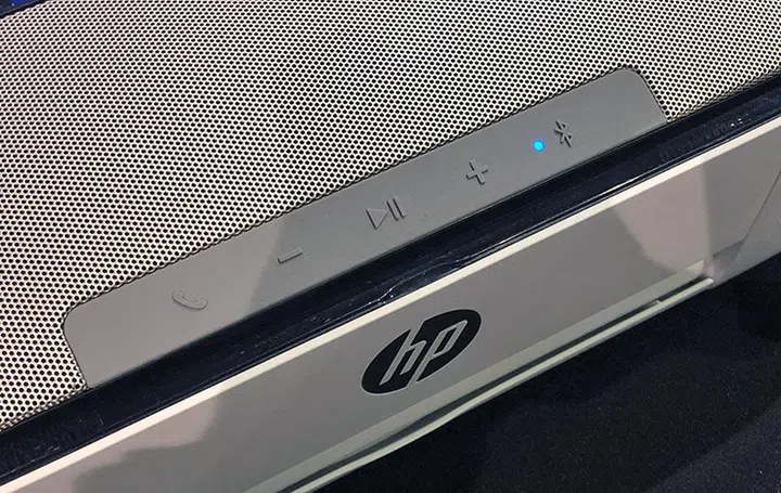 Call, volume, play/pause, and Bluetooth pairing buttons on top of the printer.
