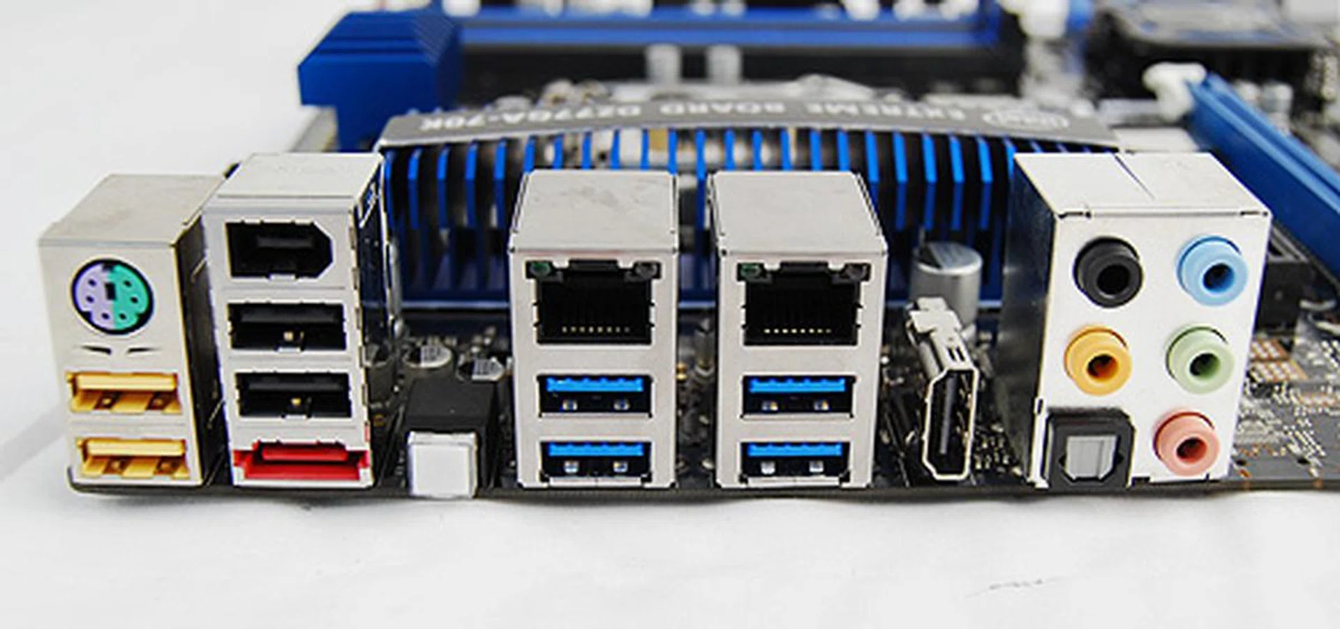 A look at the rear connectors. You get two high-speed USB 2.0 ports, two regular USB 2.0 ports, four USB 3.0 ports, an eSATA port, FireWire port, an HDMI port for display output, two RJ45 Ethernet connectors, and quite oddly, a PS/2 port for legacy mouse and keyboard devices. It's surprising to find dual LAN ports on an Intel motherboard, but sadly there's no Thunderbolt port from the proponent of the standard.