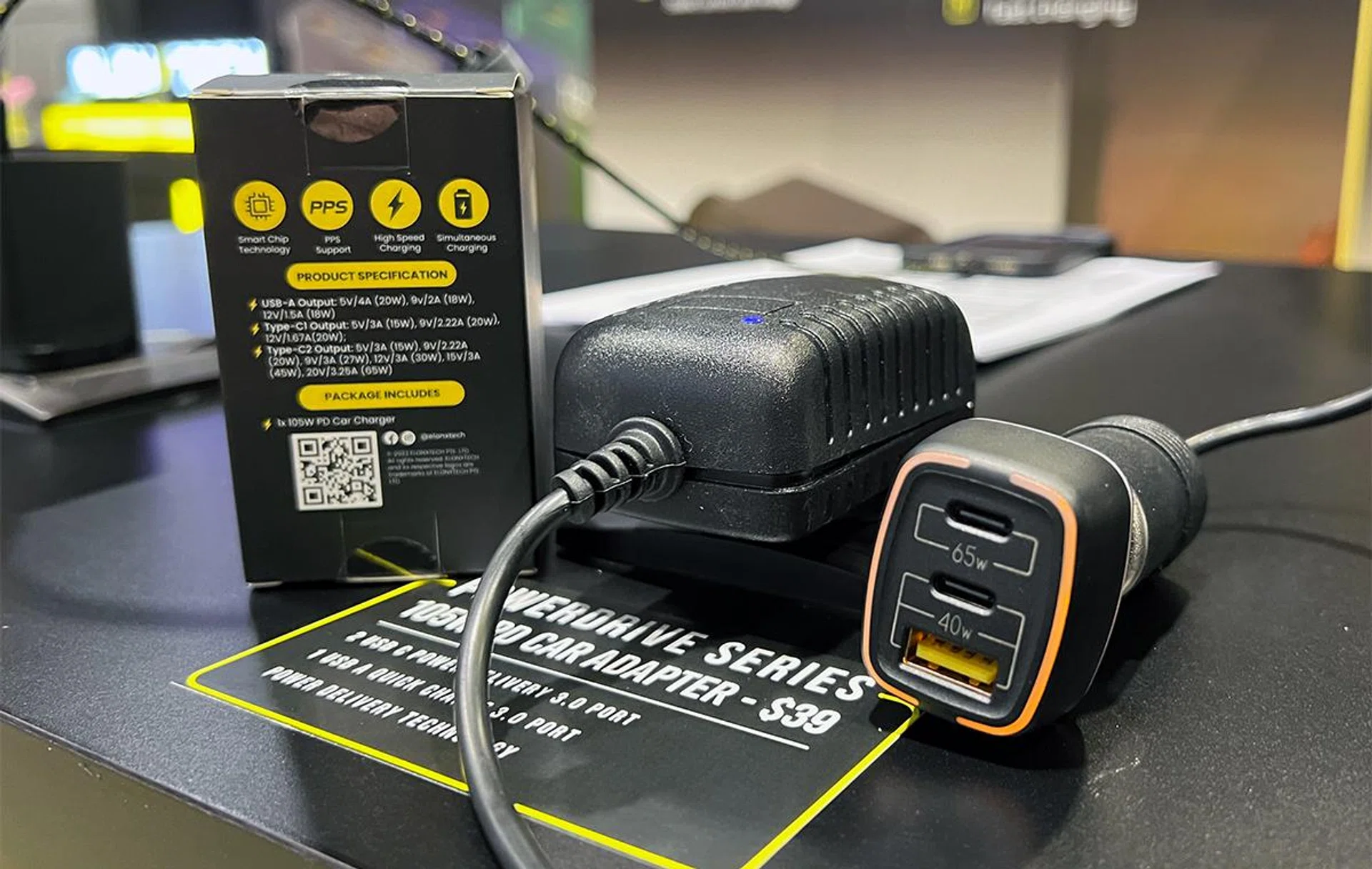 ElonxTech 105W PowerDrive Car Charger (right, plugged in).