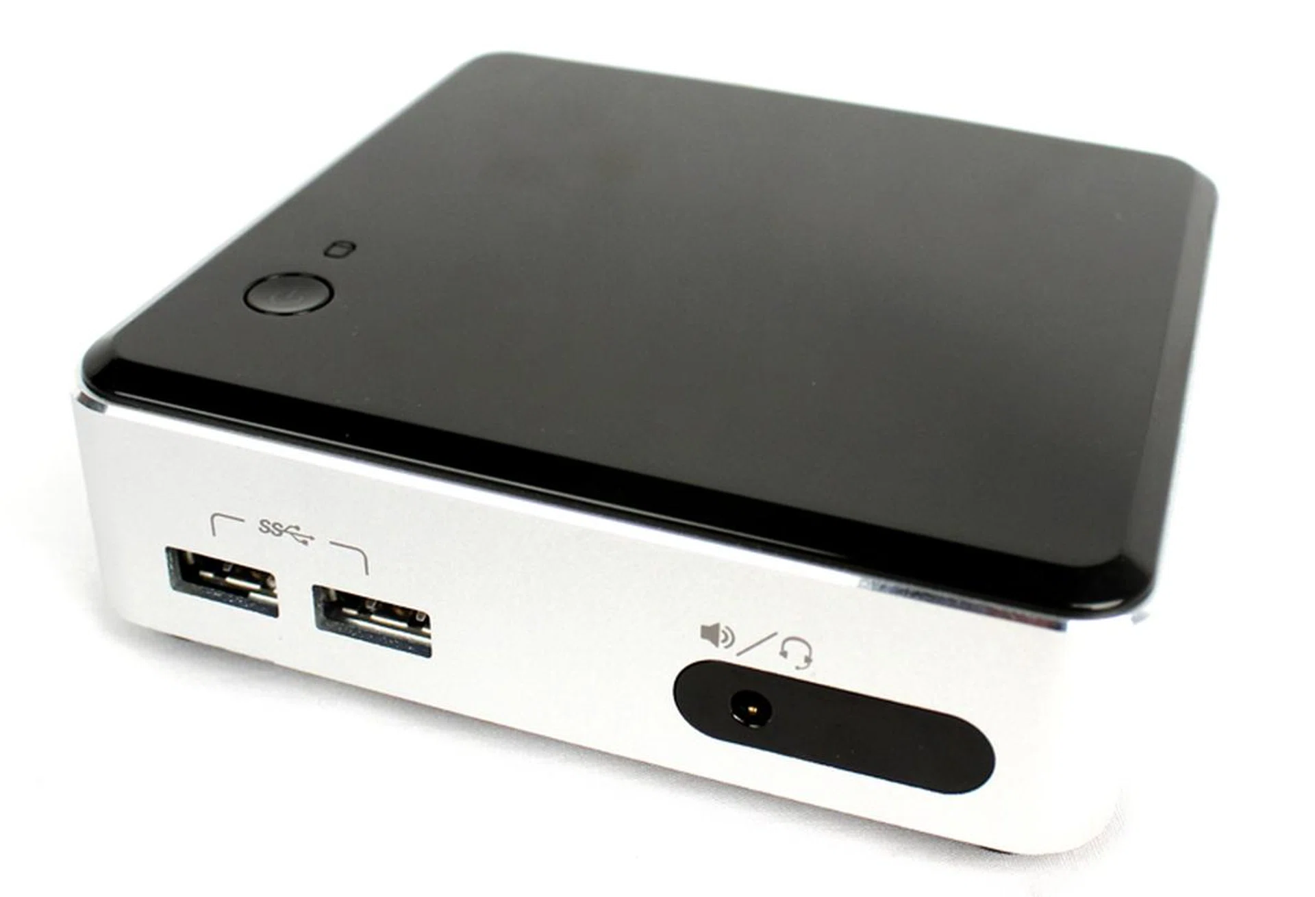 The new NUC includes a headphone/microphone audio port on the front.
