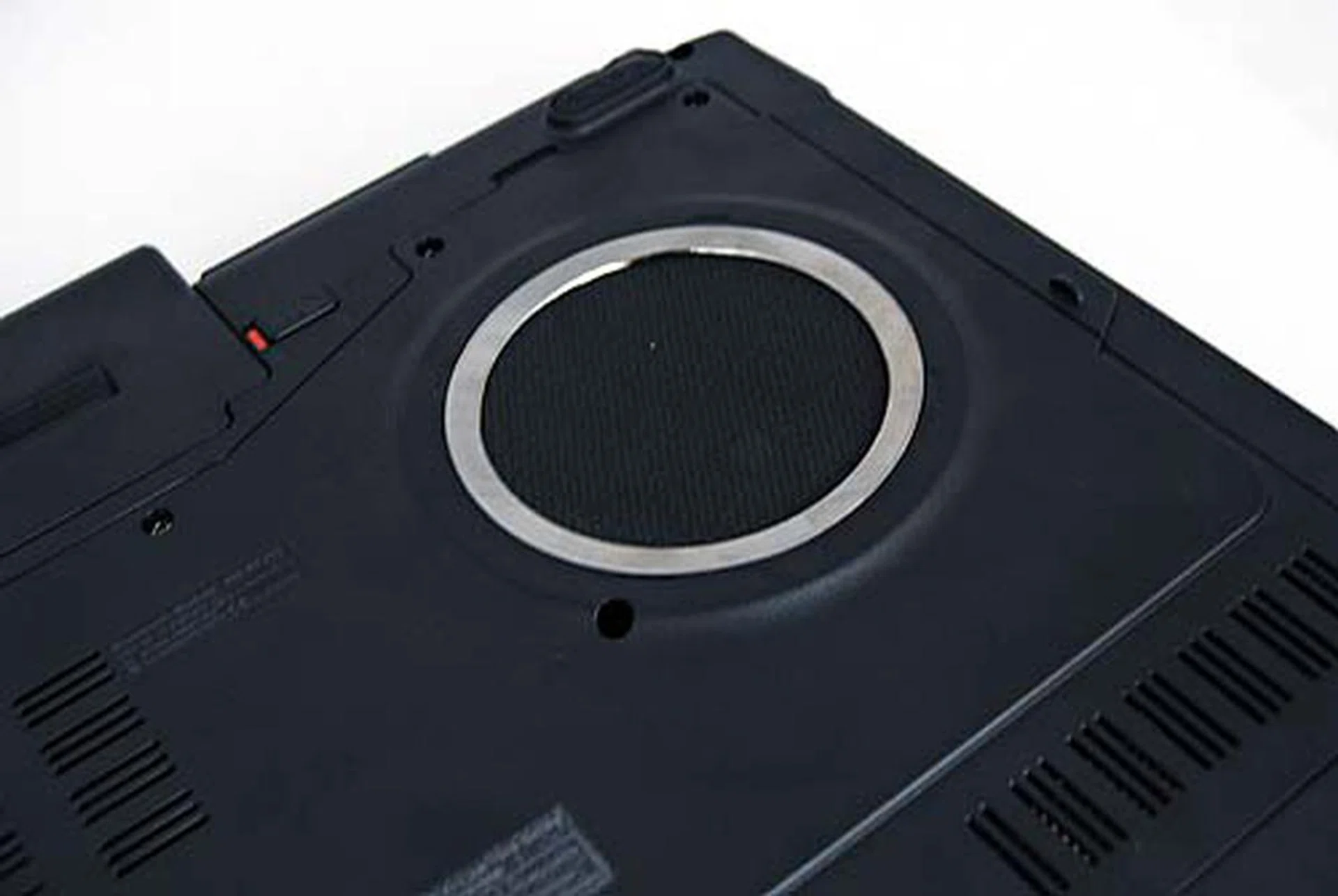 Update: The round circular object you see here is actually a fan cooler that we mistook for a subwoofer. <s>Booming beats will come from the bottom of the unit via this subwoofer.</s>