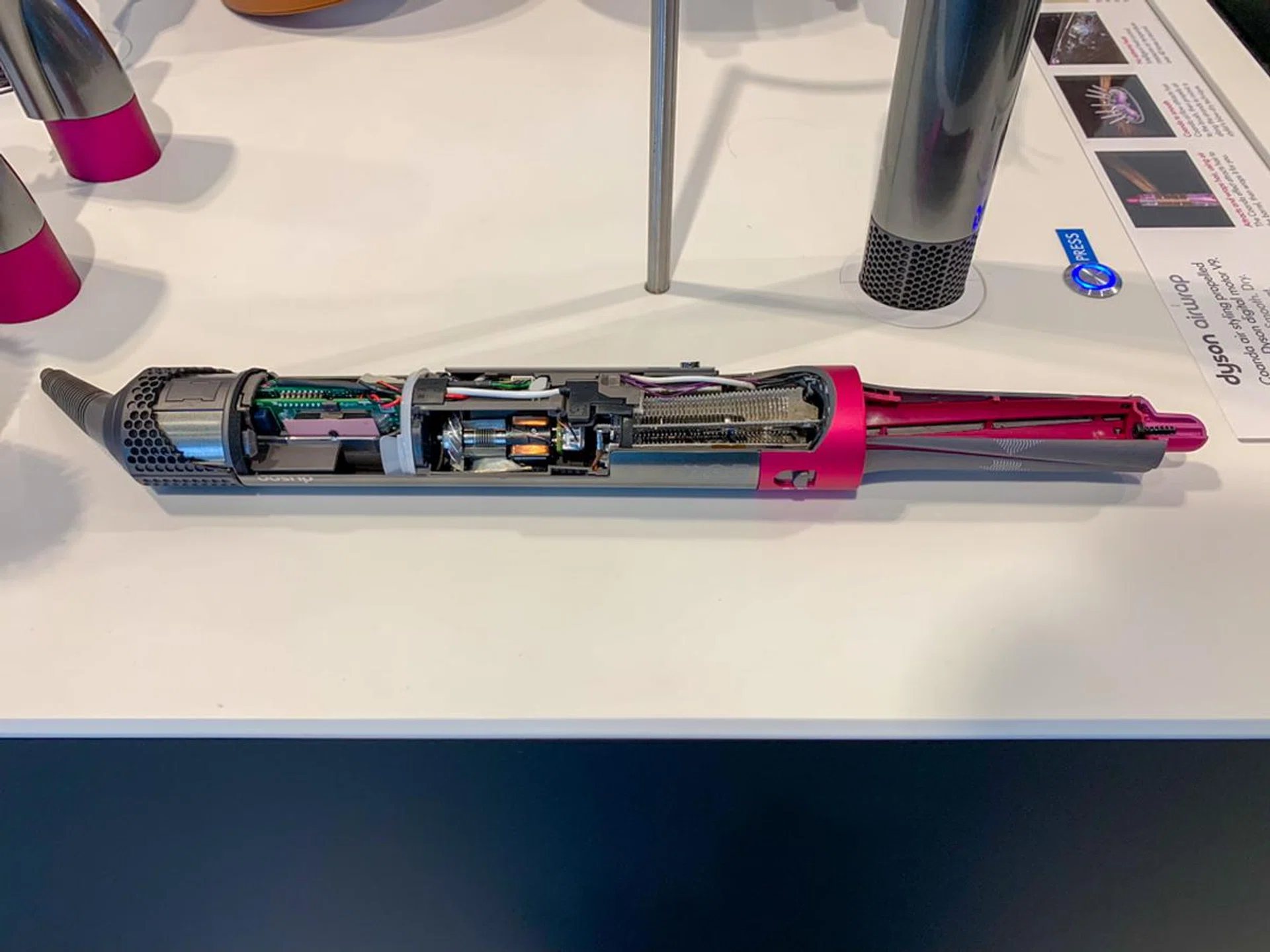 Looking like a lightsaber, the Airwrap styler houses Dyson’s powerful V9 digital motor, 