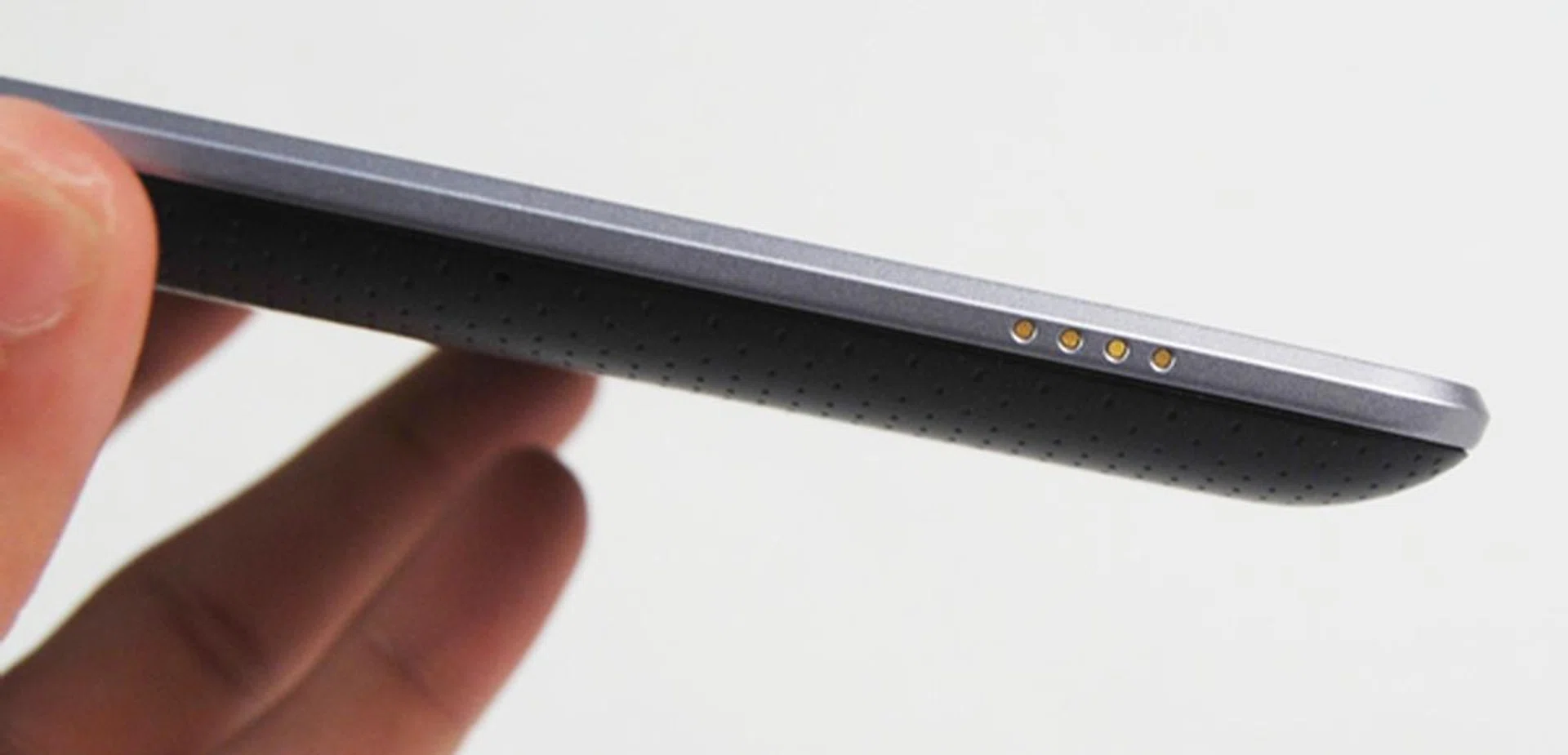 You can find the contacts for the dock on the left edge of the Google Nexus 7. This can be put to good use with the Nexus Dock accessory that allows you to view multimedia content and charge the tablet at the same time.