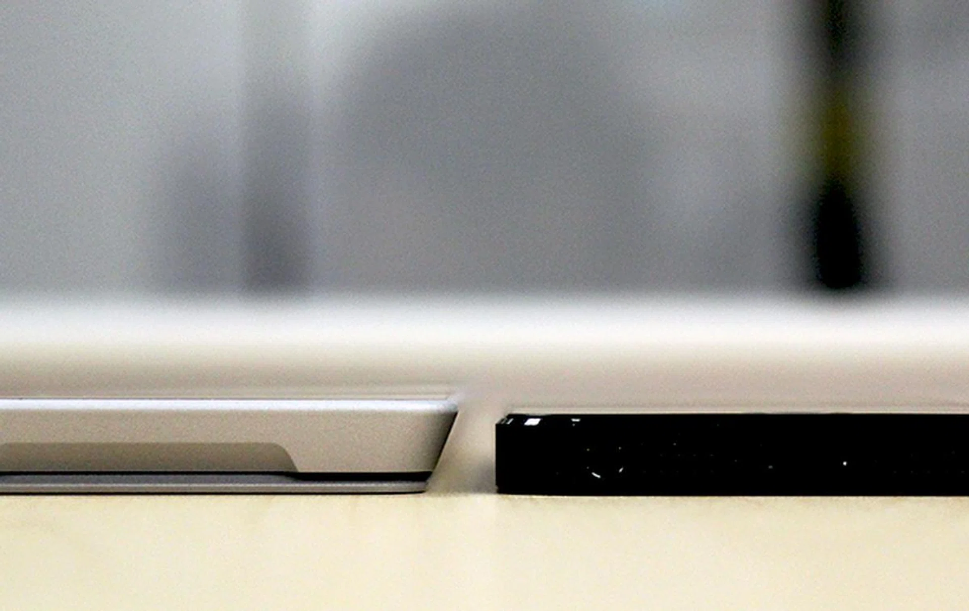 The Surface Pro 3 next to an iPhone, is only about 2mm thicker!