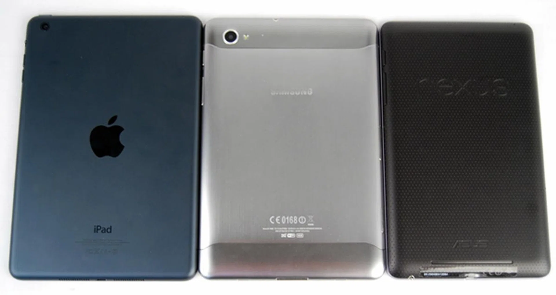 Even the aluminum back casing of the Samsung Galaxy Tab 7.7 (middle) is no match for the premium feel and finish of the Apple iPad Mini (left). As for the Google Nexus 7, its dimpled pattern on the back gives a unique look and aids handling, but in some ways, it's still inferior to the Apple slate. Sadly, the Nexus 7 isn't any lighter even though it has a plastic case.