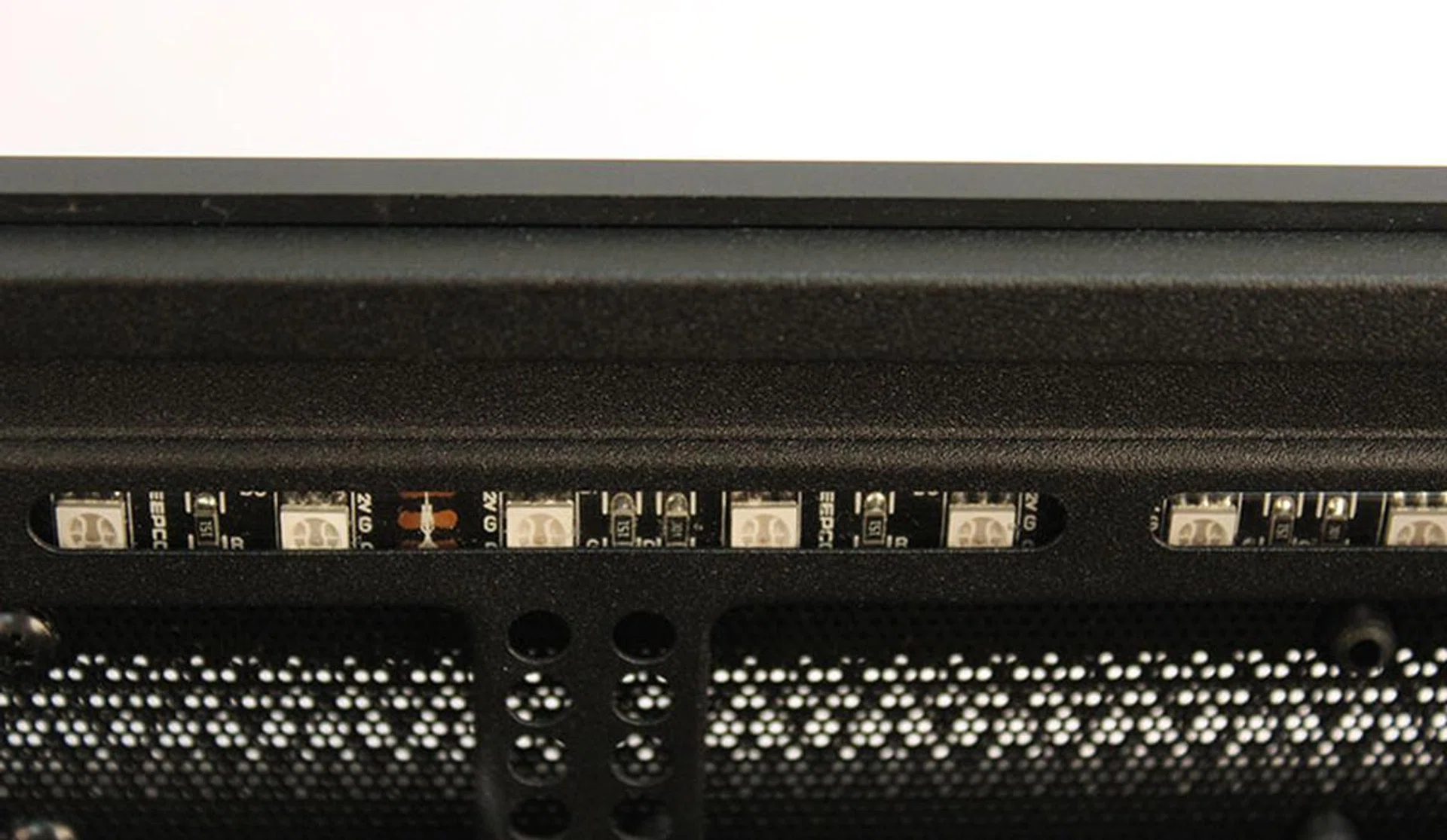An LED light strip is tucked into the edges of the chassis. 