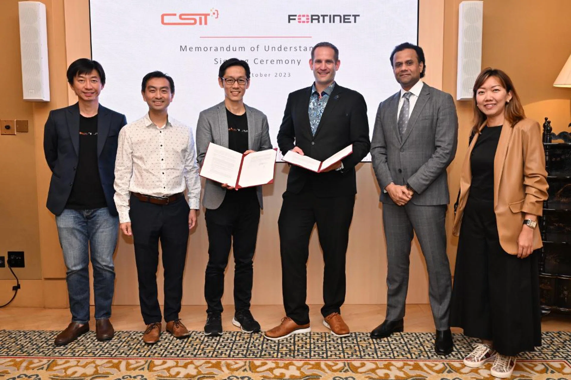 Darren Teo, Chief Executive, CSIT, Ng Chad-Son, Deputy Secretary (Technology), MINDEF, Tan Yi Zhao, Deputy Chief Executive, CSIT, Derek Manky, Global VP, Threat Intelligence, Fortinet, Vishak Raman, Vice President, India, S.E.A, HK and ANZ, Fortinet, and Joyce Loh, Sales Director, Government and Healthcare, Fortinet. Image source: Fortinet
