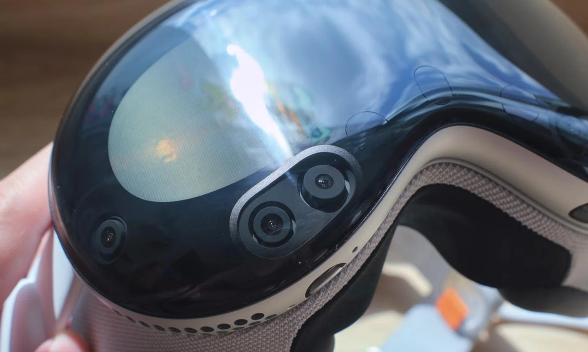 Multiple cameras hidden around the Vision Pro's front glass panel enable incredible video passthrough.