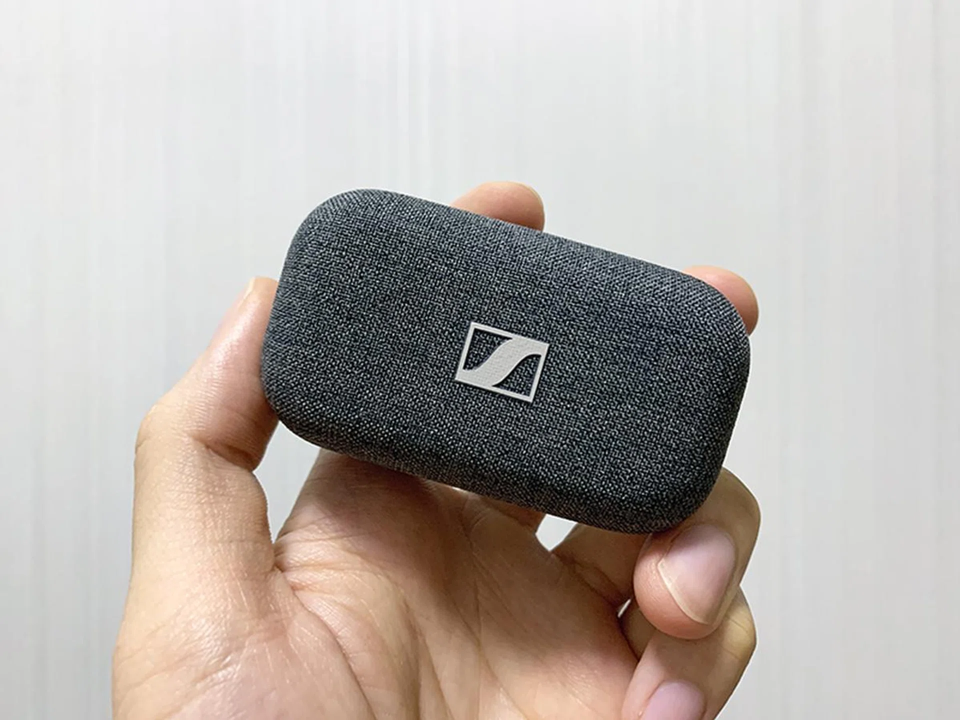 The darker coloured case on the MTW2 looks sleeker and more sophisticated.