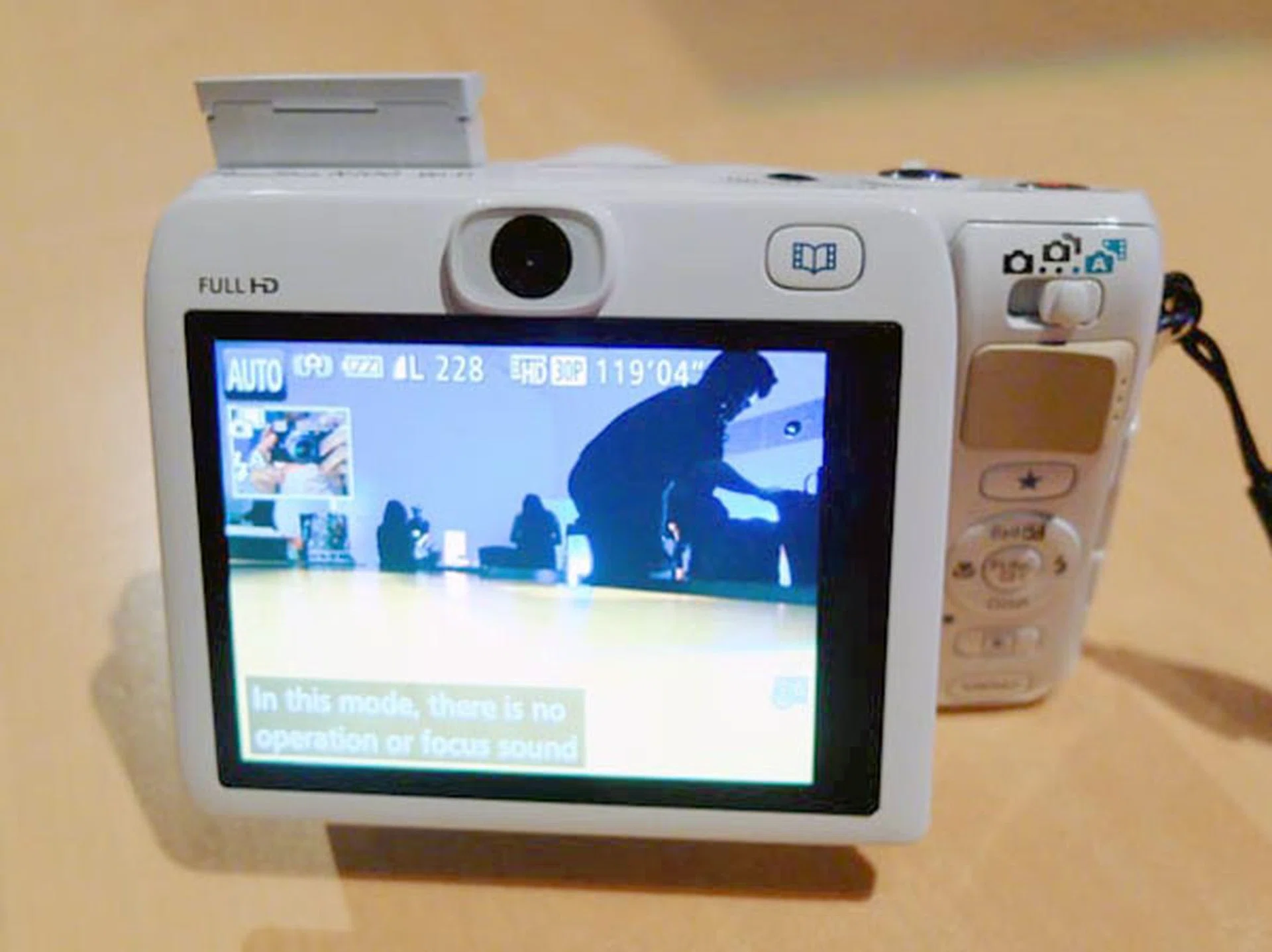 Notice the small 'picture-in-picture' window on the top left of the display? That's from the rear-facing camera that sits on top of the rear LCD screen.
