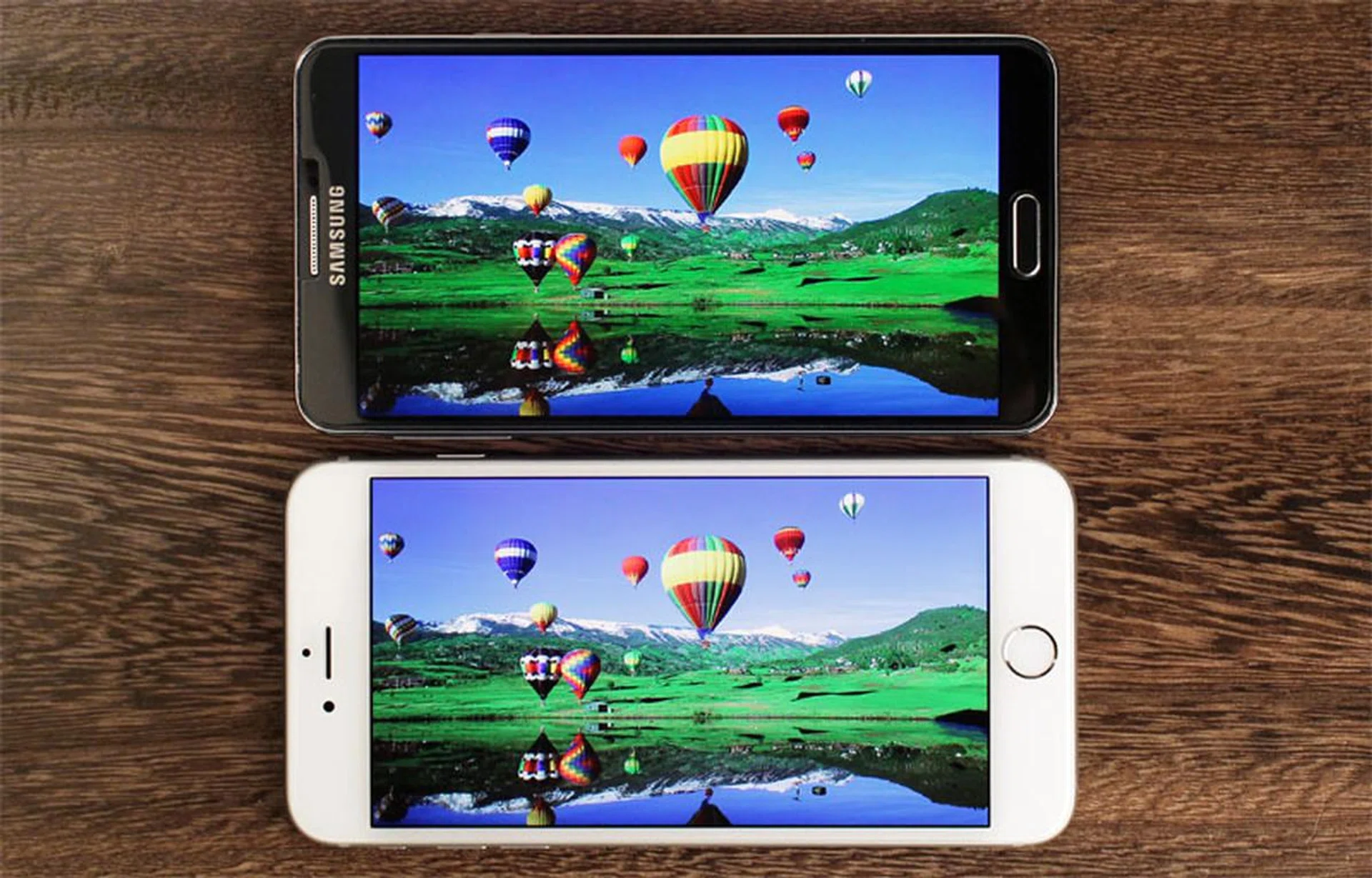 Samsung's Galaxy Note 3 (top) is more vivid and saturated, but the iPhone 6 Plus looks more natural.