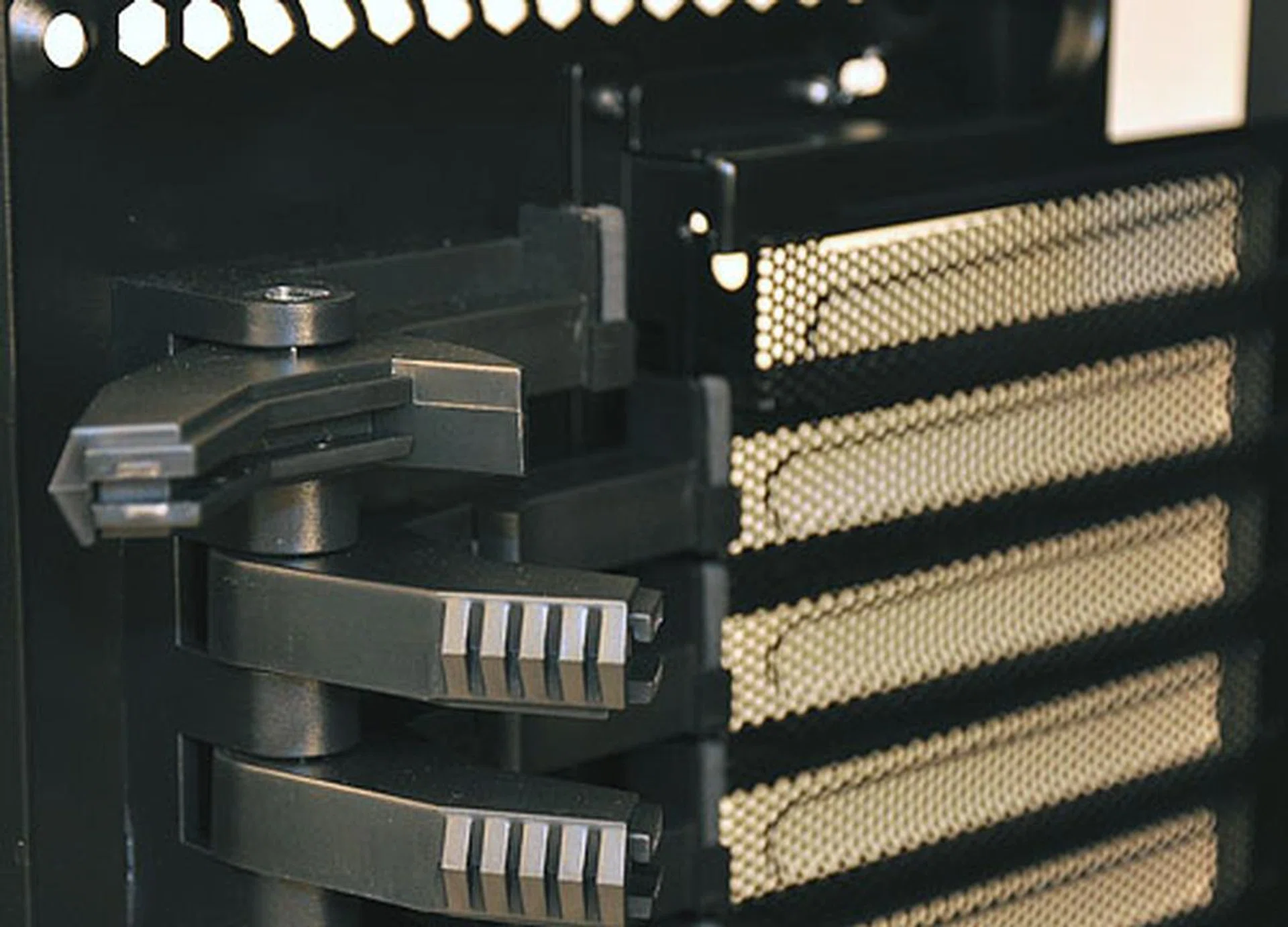 BitFenix has probably created one of the stoutest designs ever to secure the PCI expansion slots. It's a sturdy mechanism that snaps onto your add-on cards with a satisfying thud. And it has no problems with dual-slot cards either.