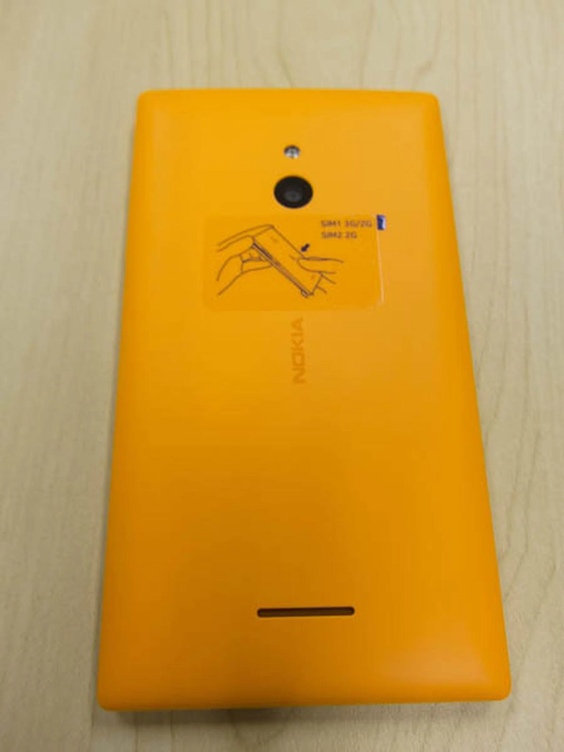 The colourful orange back cover