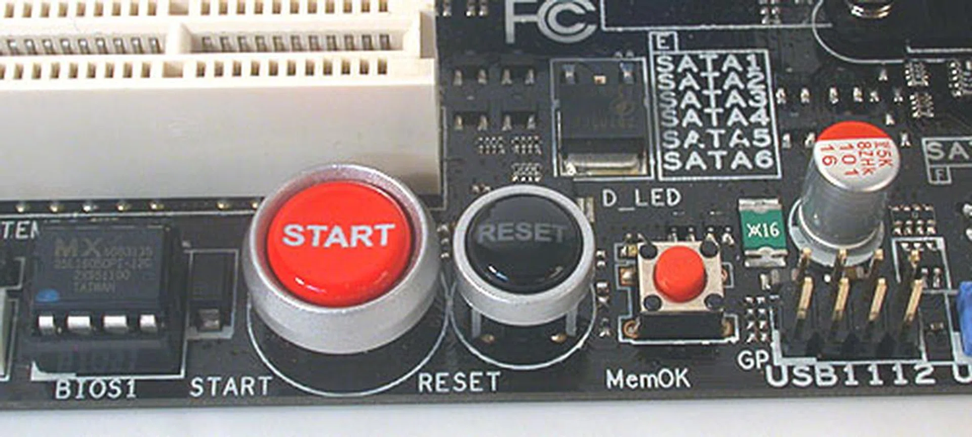 Besides the Power and Reset buttons, the new feature on the Gene is the small red circular button that is the MemOK! switch, a memory rescue tool from ASUS that claims to patch memory issues by ensuring that the memory settings are correct. 