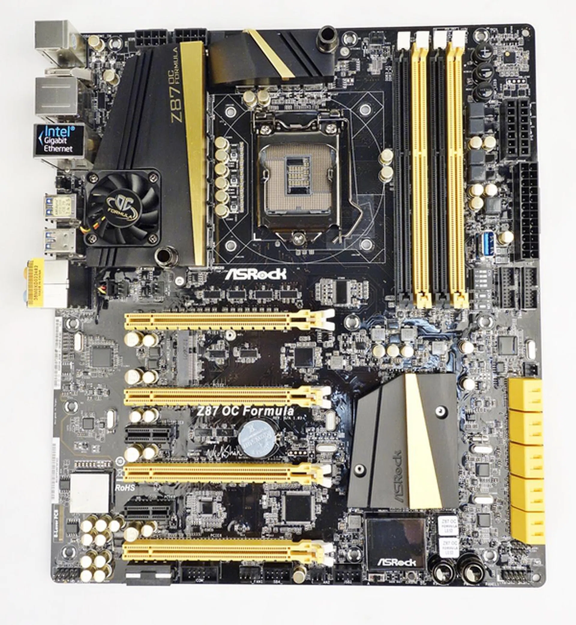 The ASRock Z87 OC Formula is the only EATX board in our lineup. It sports a slightly wider girth than an ATX board, and true to its OC Formula pedigree, it features the OC Formula Power Kit that drives its 12-phase power delivery system.