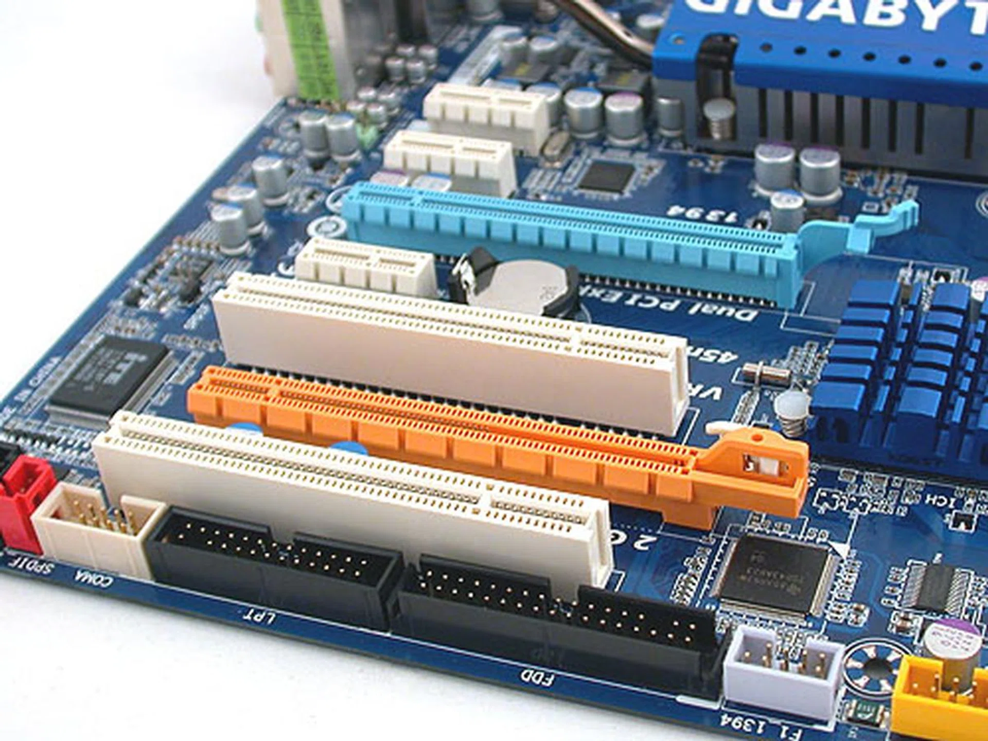 This Gigabyte board supports up to 16GB of DDR2-1366 (when overclocked). The power and IDE connectors are located near the edge of the board, as is often the norm nowadays. 