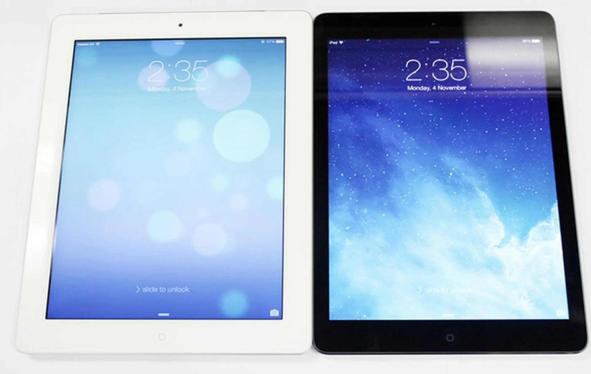 Side by side comparison between the Apple iPad 3 (left) and iPad Air (right).