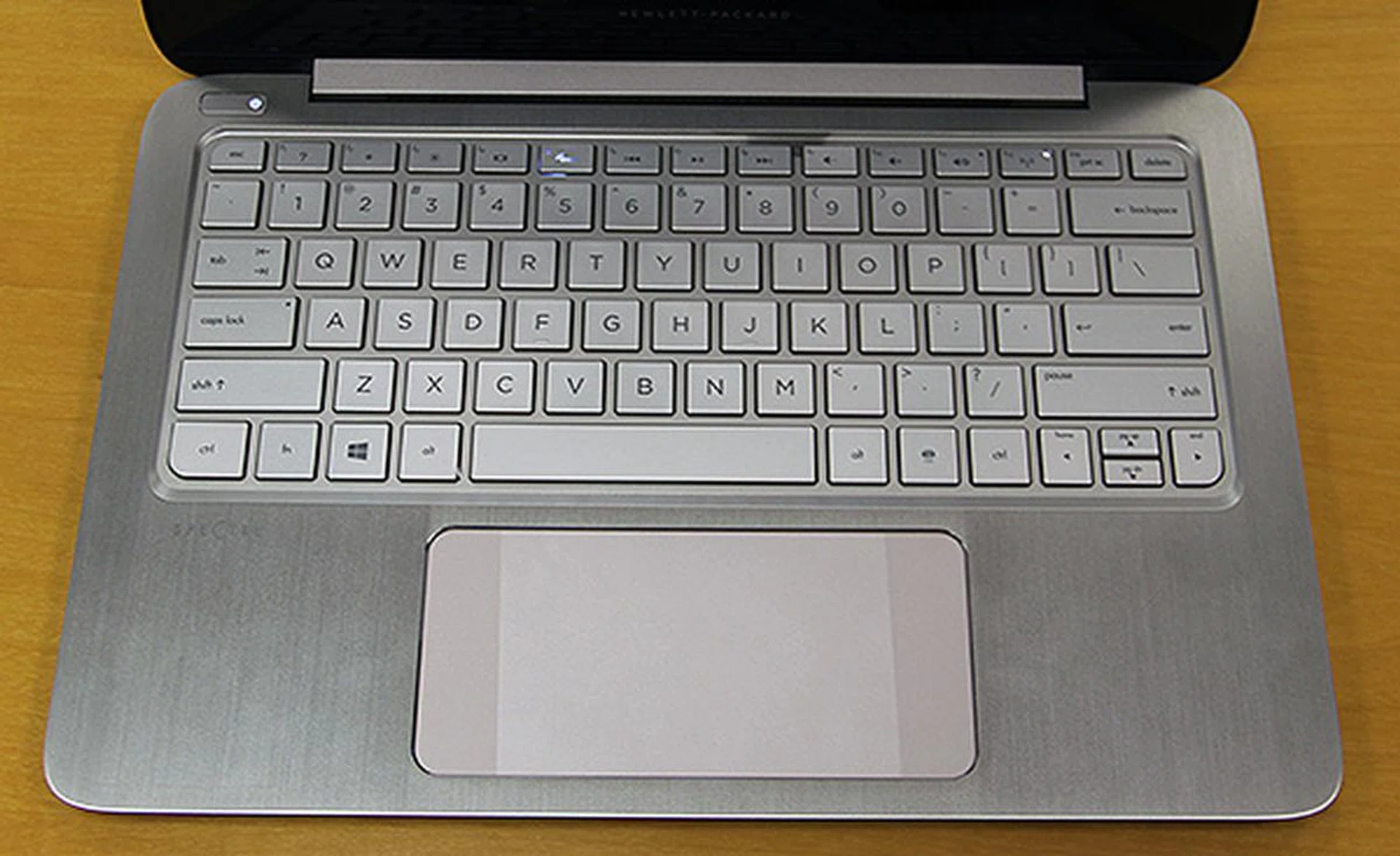 Note the two "Control Zones" on the ultra-wide trackpad. They mimic the left and right most corners of your display, allowing users to quickly activate Charms and snap apps of the Windows 8 operating system.