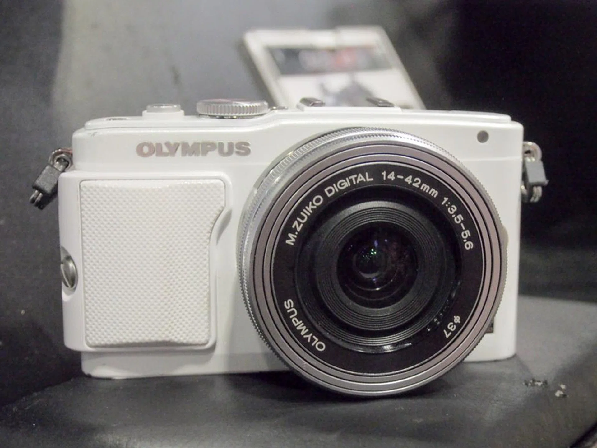 The PEN E-PL6 is a 16-megapixel interchangeable lens camera that comes with a tilt-and-reverse LCD monitor for easy selfies. This is going for $598 with both the 14-42mm kit lens and the 40-150mm R f/4.0-5.6 lens, a spare battery, one 16GB SD card, an 8GB Toshiba FlashAir SD card, a carrying case, 3 months local extended warranty, and a product workshop. Also, the first 20 customers everyday get the option of purchasing the LG Pocket Printer for $29 (usual price $198).