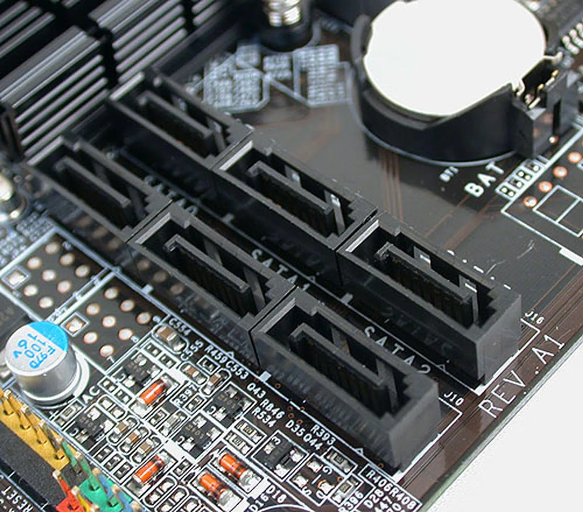 We usually prefer our SATA ports to be aligned outwards at the edge of the board so DFI's arrangement here is not ideal. Fortunately, it's not compounded by being close enough to interfere with the graphics card. A long PCI or PCIe x1 card however could pose some issues.
