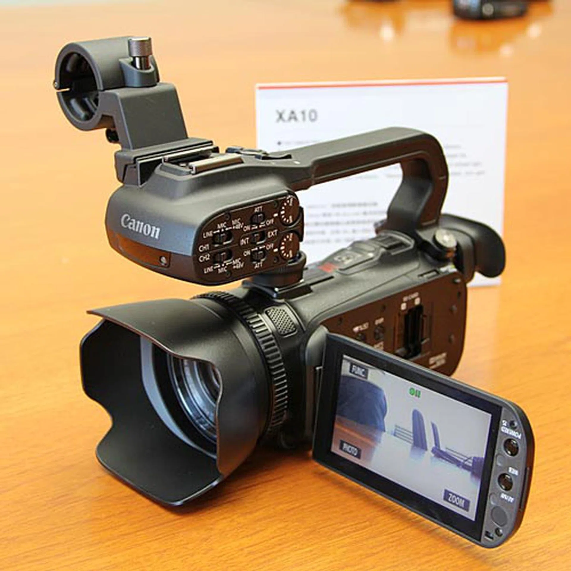 Also announced is the XA10 pro-level, ultra compact AVCHD camcorder. It uses the same HD CMOS Pro sensor (that has a pixel size 2.6x larger than typical CMOS sensors) and 30.4 mm wide-angle lens with 10x optical zoom as the HF G10. Its other highlight is the multifunction, detachable handle. When attached, it expands audio performance with an XLR terminal, microphone holder, and other features. It also comes with a built-in infrared lamp for low-light shooting and light diffusing. Other features include Cinema Style, manual shooting controls, assignable buttons, 64 GB internal memory, dual SDXC-compatible slots, and up to 24 Mbps recording.