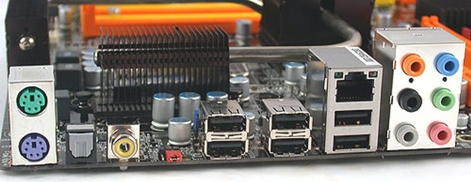 The rear ports of the DFI LANParty DK P45-T2RS PLUS are quite typical of this class of motherboards, including optical and coaxial SP/DIF outputs, Gigabit LAN, audio jacks and six USB 2.0 ports. Additionally, DFI has a clear CMOS jumper at the rear, useful for overclockers and unlike a button, no chance of users accidentally clearing the CMOS. 