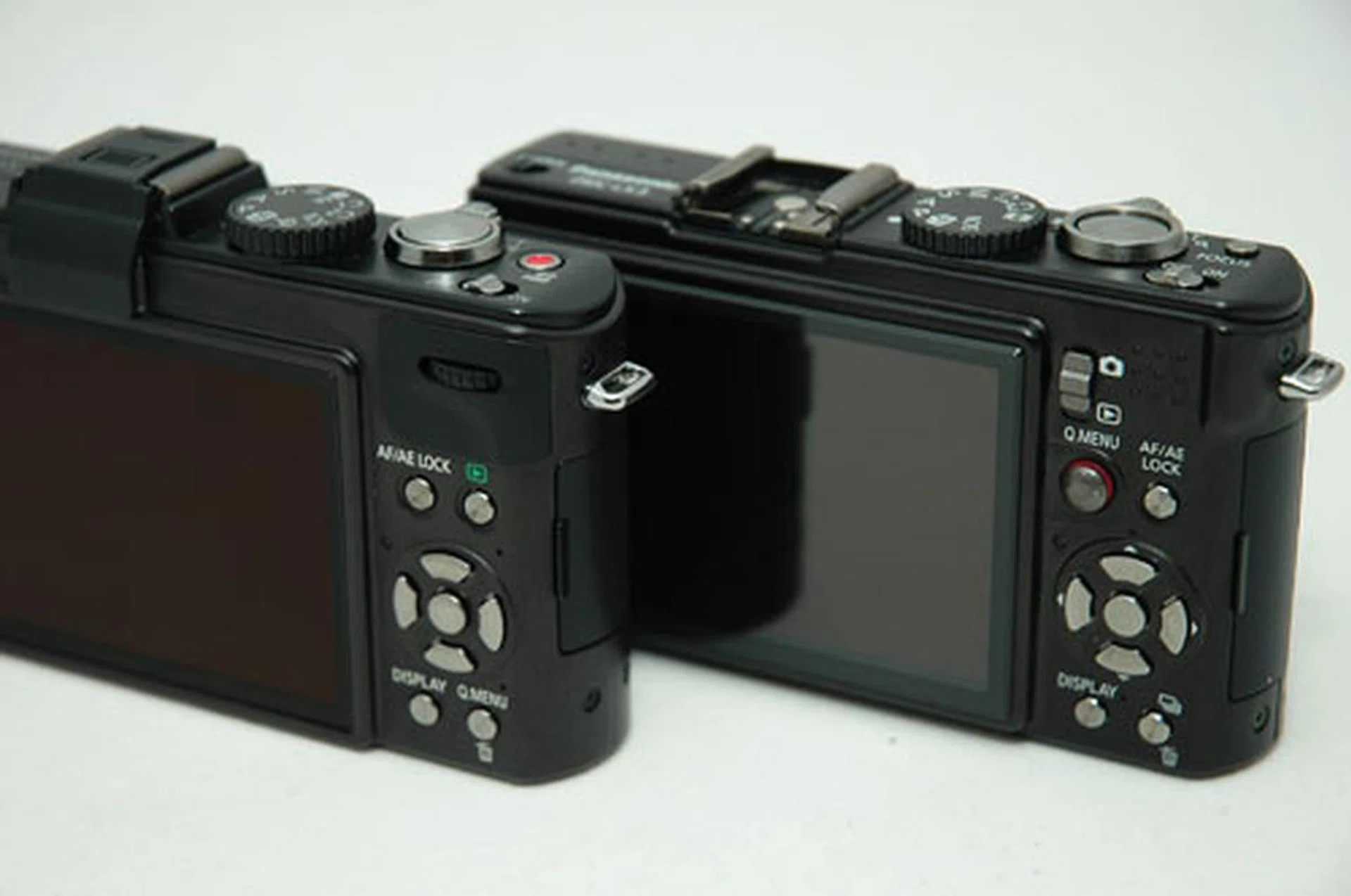 The LX5 sits on the left, while the LX3 is on the right.