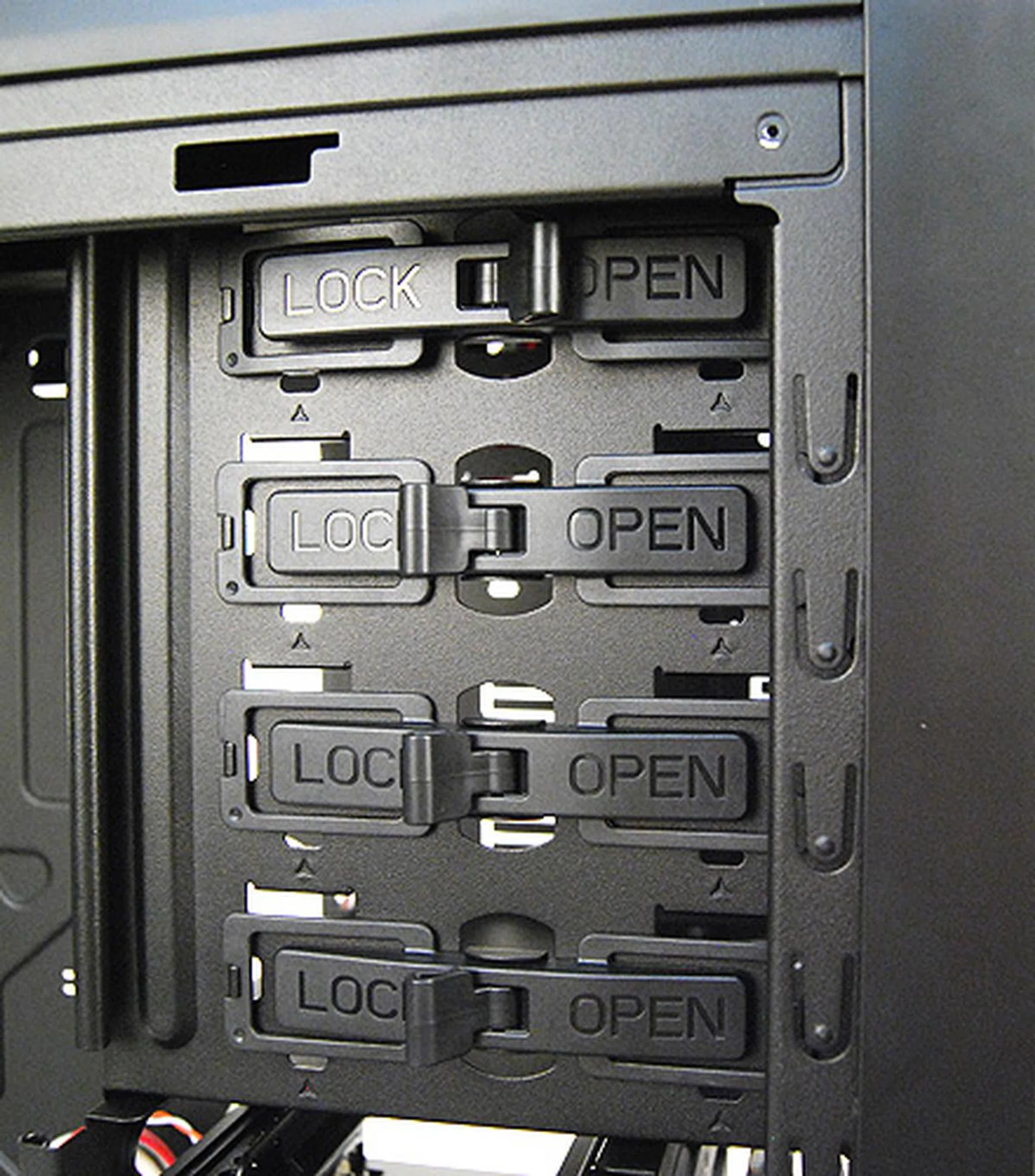 The 5.25-inch drive bays make use of a simple latch system to install components.