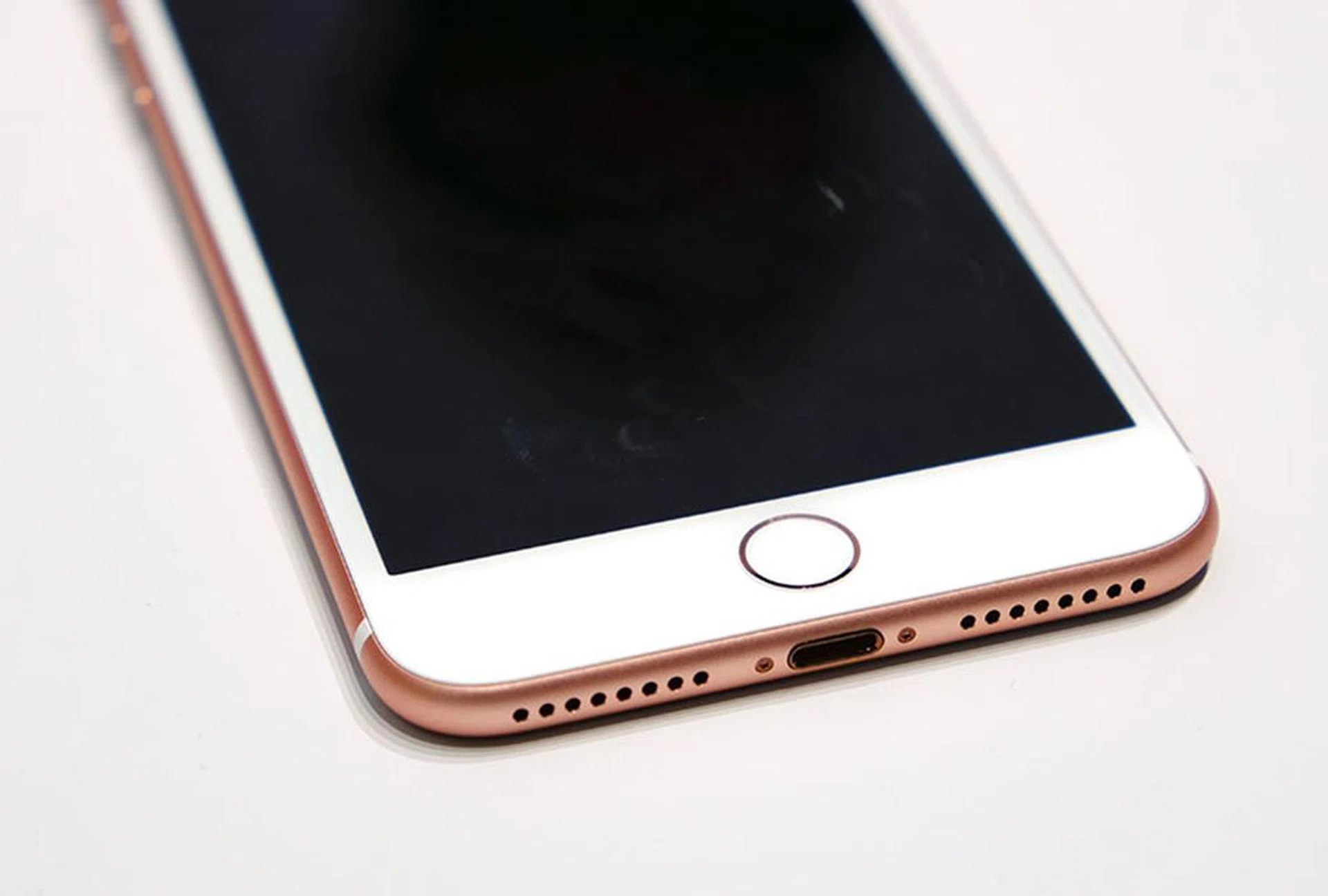 The Home button doesn't actually move. Also, notice the lack of a 3.5mm headphone jack.