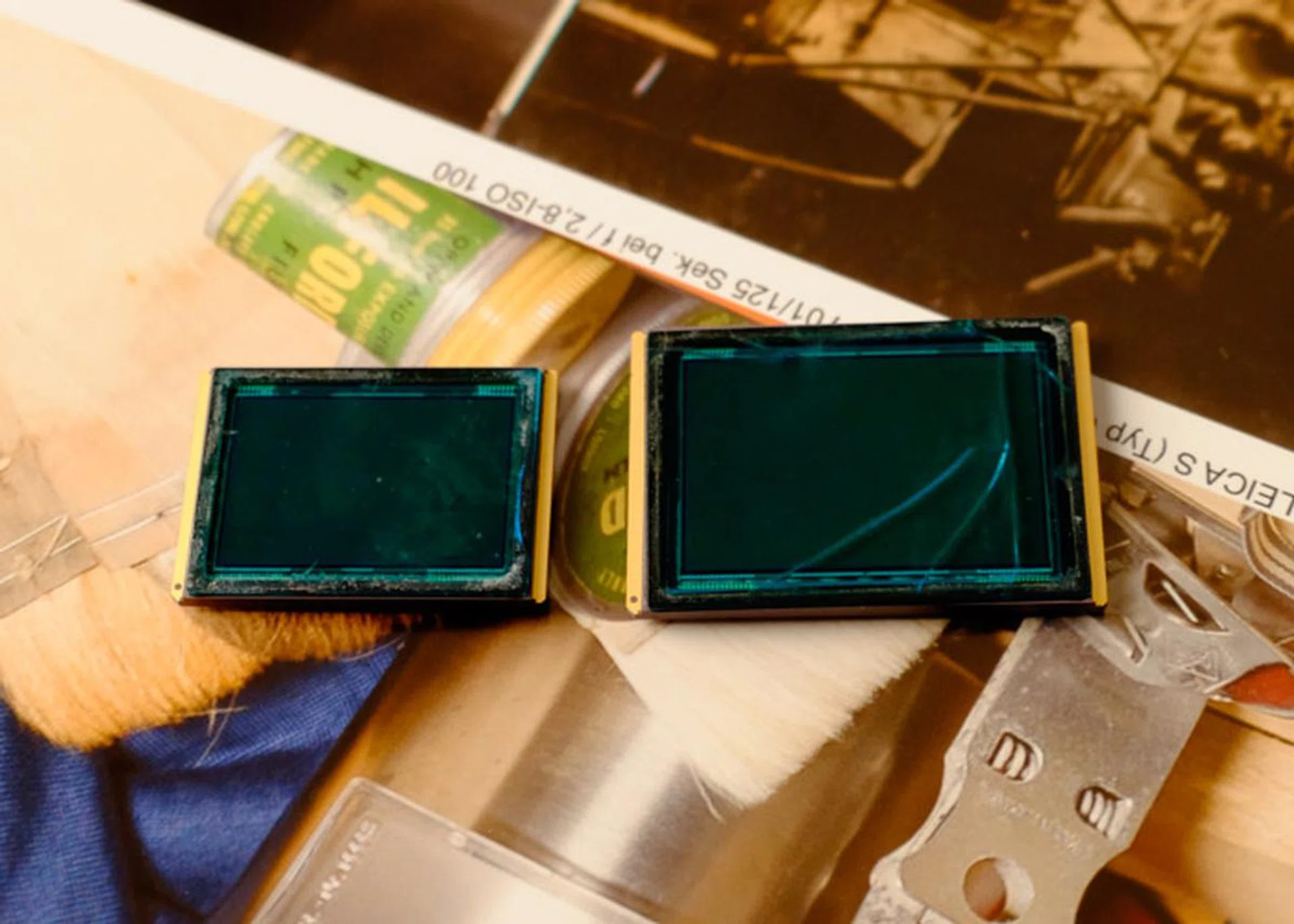 A simple size comparison. A  life-sized model of a full-frame 35mm sensor with the larger Leica sensor next to it. 