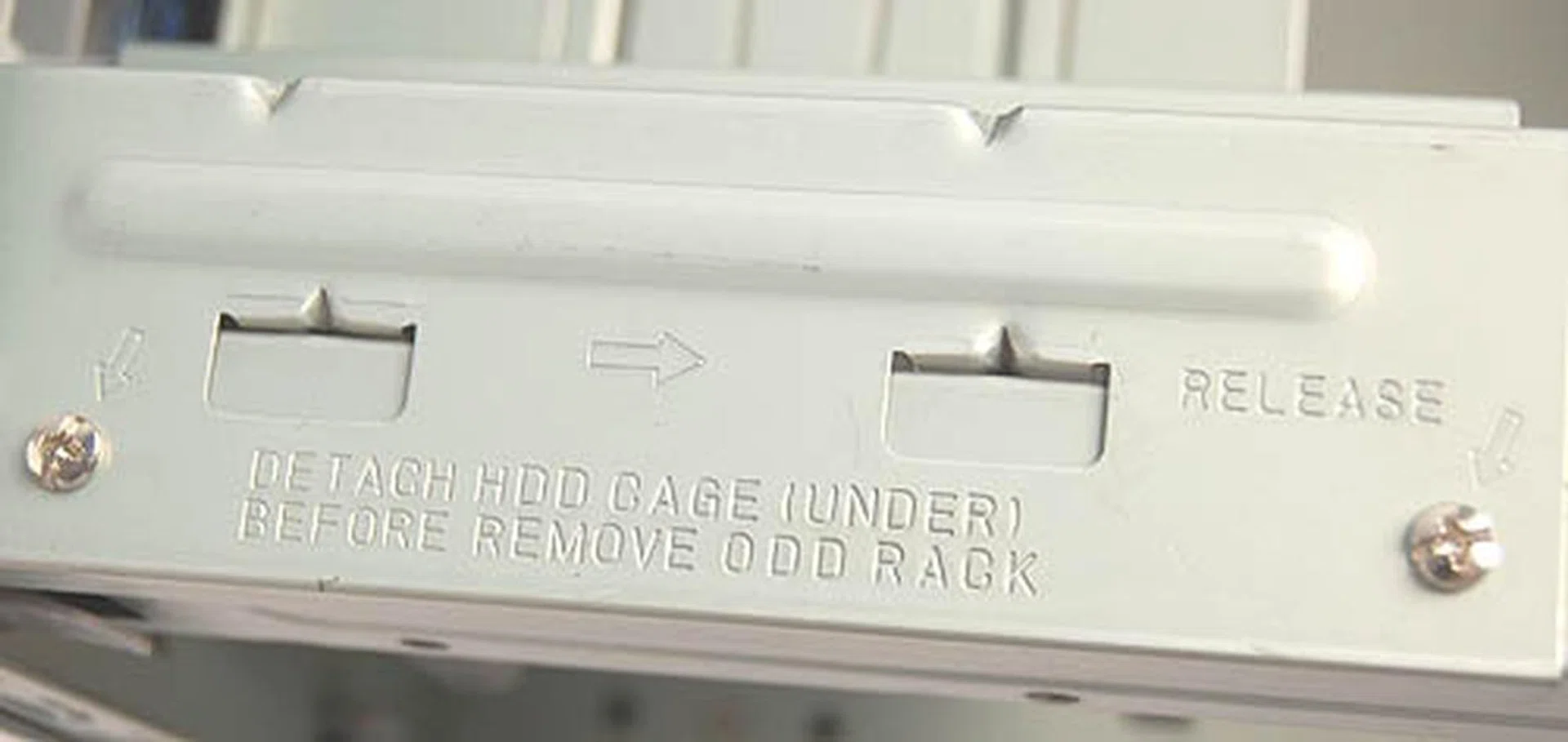 Instructions for removing the drive cages. Again, a screwdriver is essential.