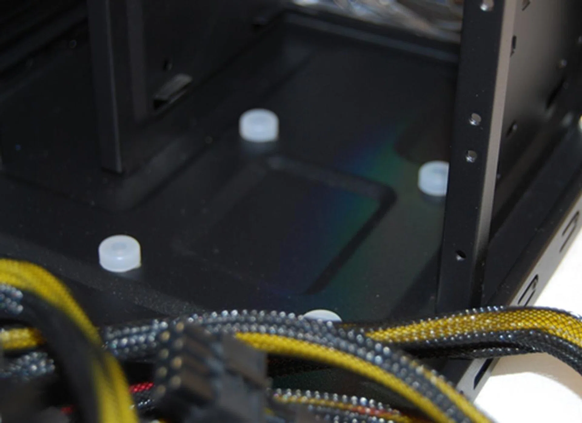 Finally, tool-free installation of the rubber grommets for your SSD (solid state drive).