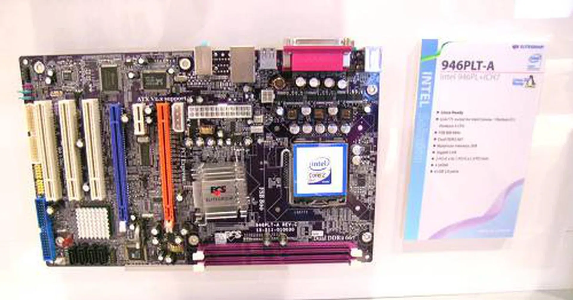 The mainstream 946PLT-A is based on the revised Intel 946PL Express chipset with a standard ICH7 Southbridge. It has Core 2 Duo support though memory is limited to DDR2-667. The board does have dual PICe x16 slots though.