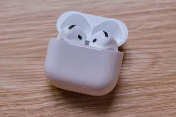 The Apple AirPods 5 with wireless charging case.