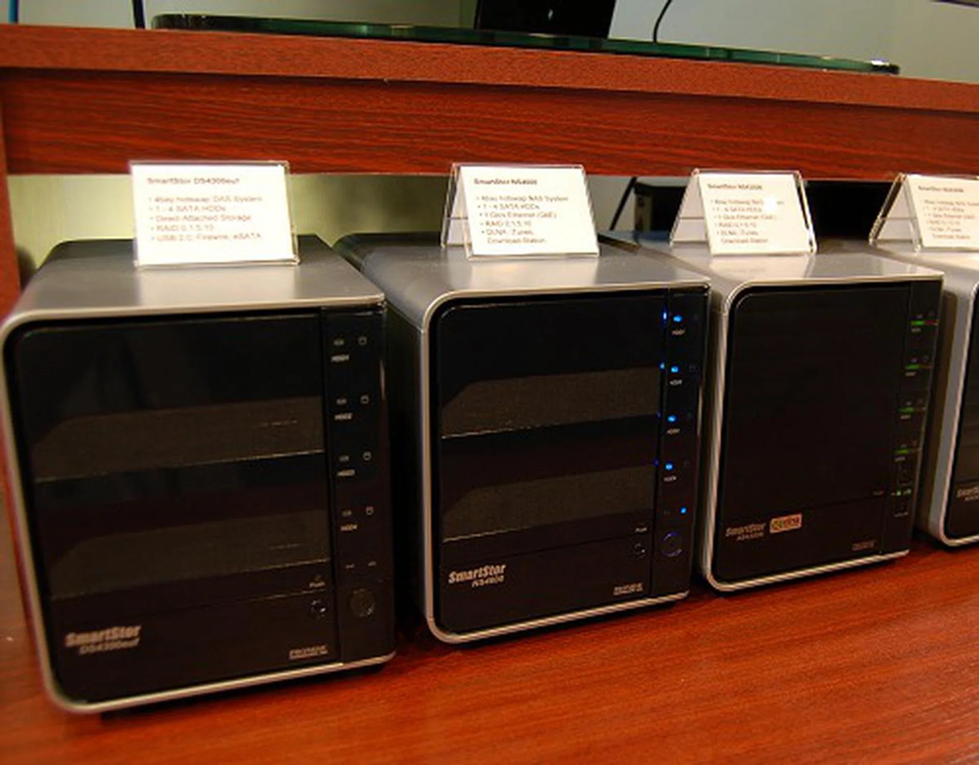  However what interested us was their range of NAS devices. Only the middle one is new though - the SmartStor NS4600. It looks identical to the NS4300 boxes that flank it, but the NS4600 is more than just a NAS, it's also a digital media server and that's new from Promise.  