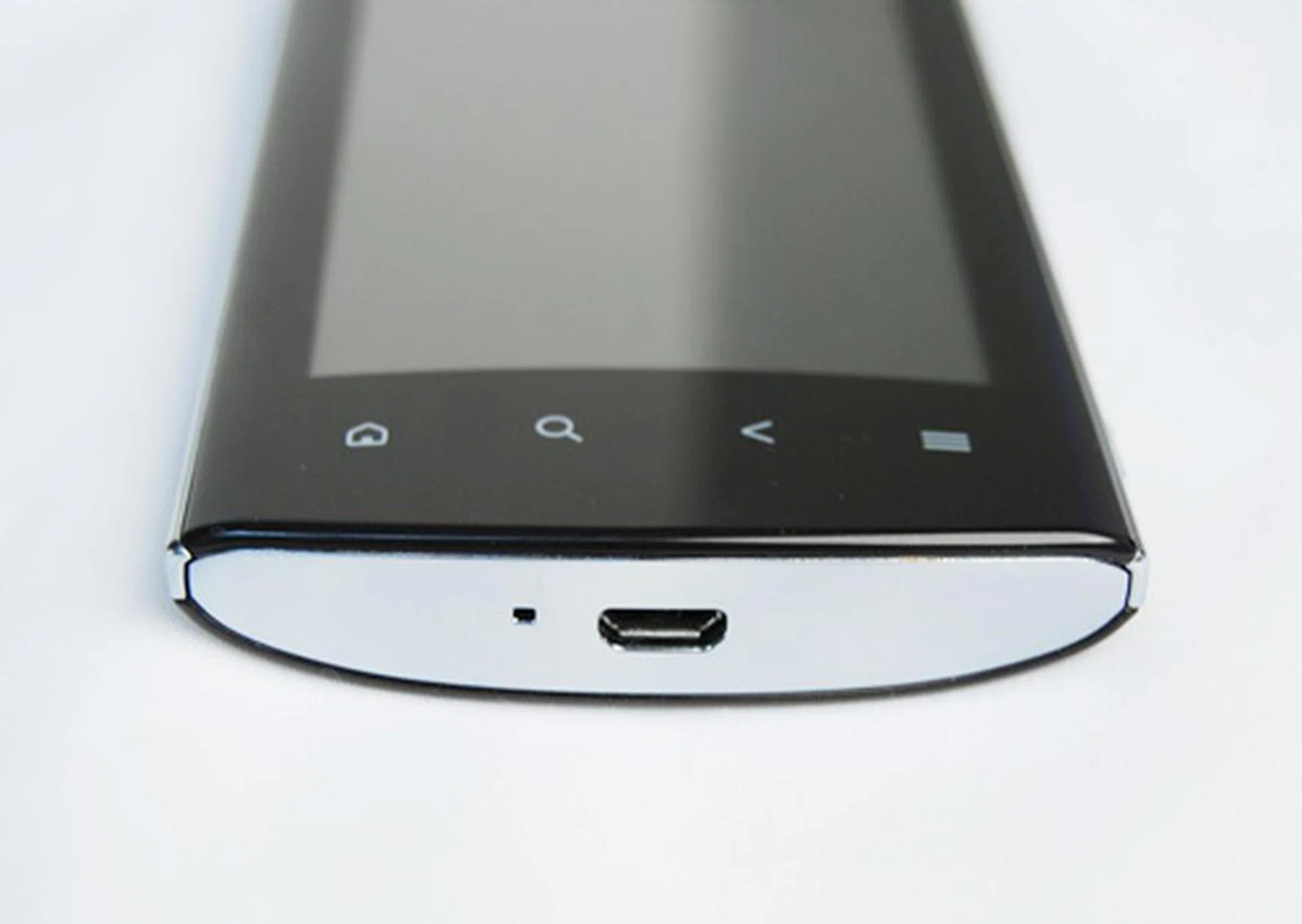 You will find a mini-USB port on the bottom of the phone. 