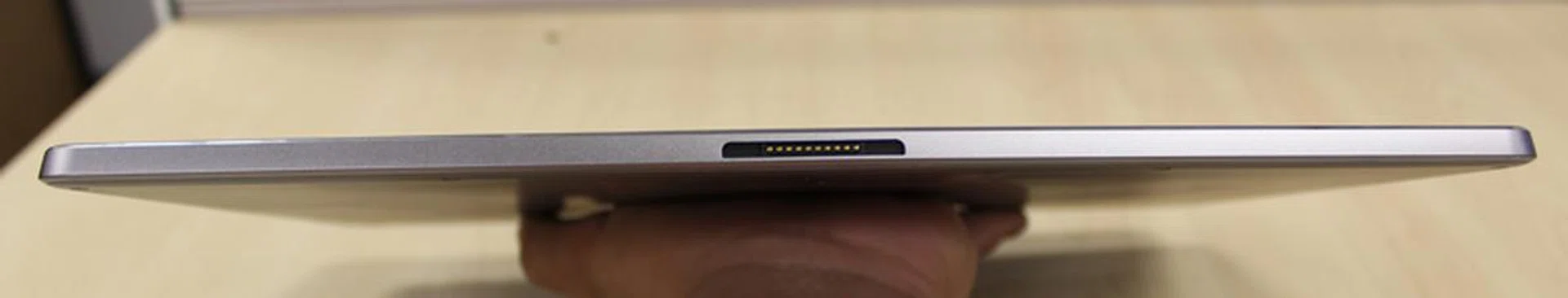 The ZIF pogo pin connector  located at the bottom of the tablet can be used to connect with other compatible devices (such as keyboards or docks) that have the same connector type.